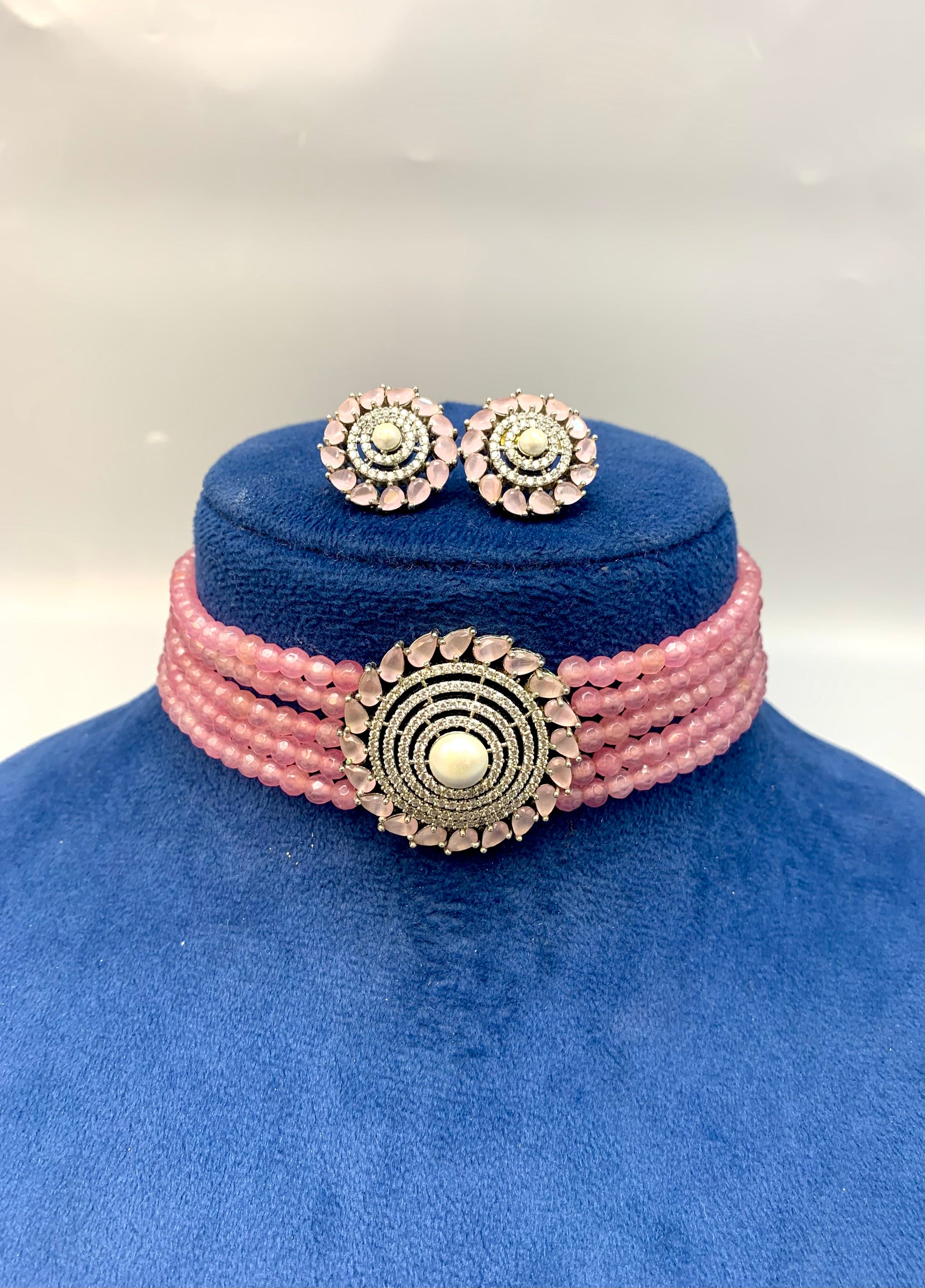 Erina handcrafted rhodium plated choker set with American diamonds pearls and pink Onyx
