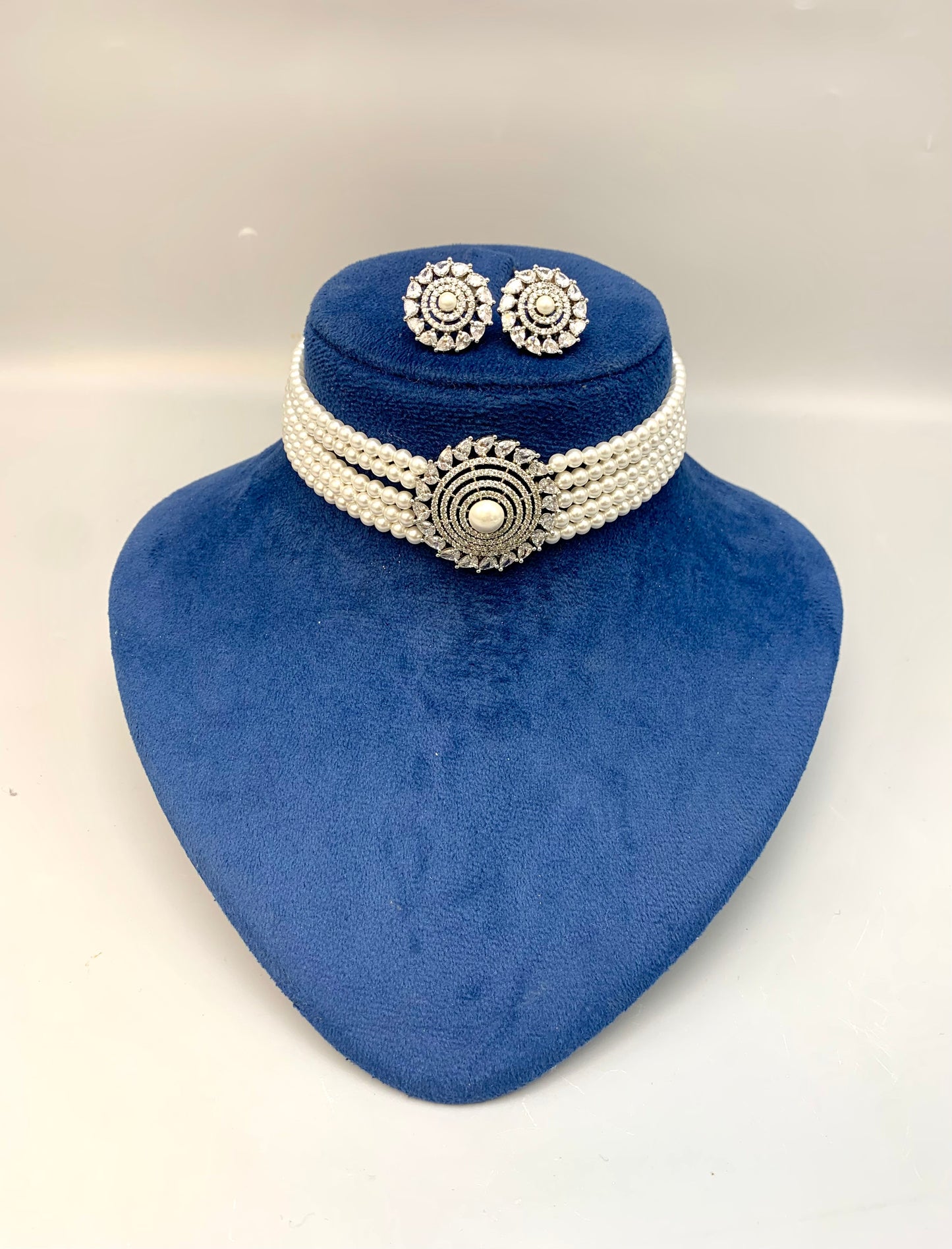 Erina handcrafted rhodium plated choker set with American diamonds pearls 