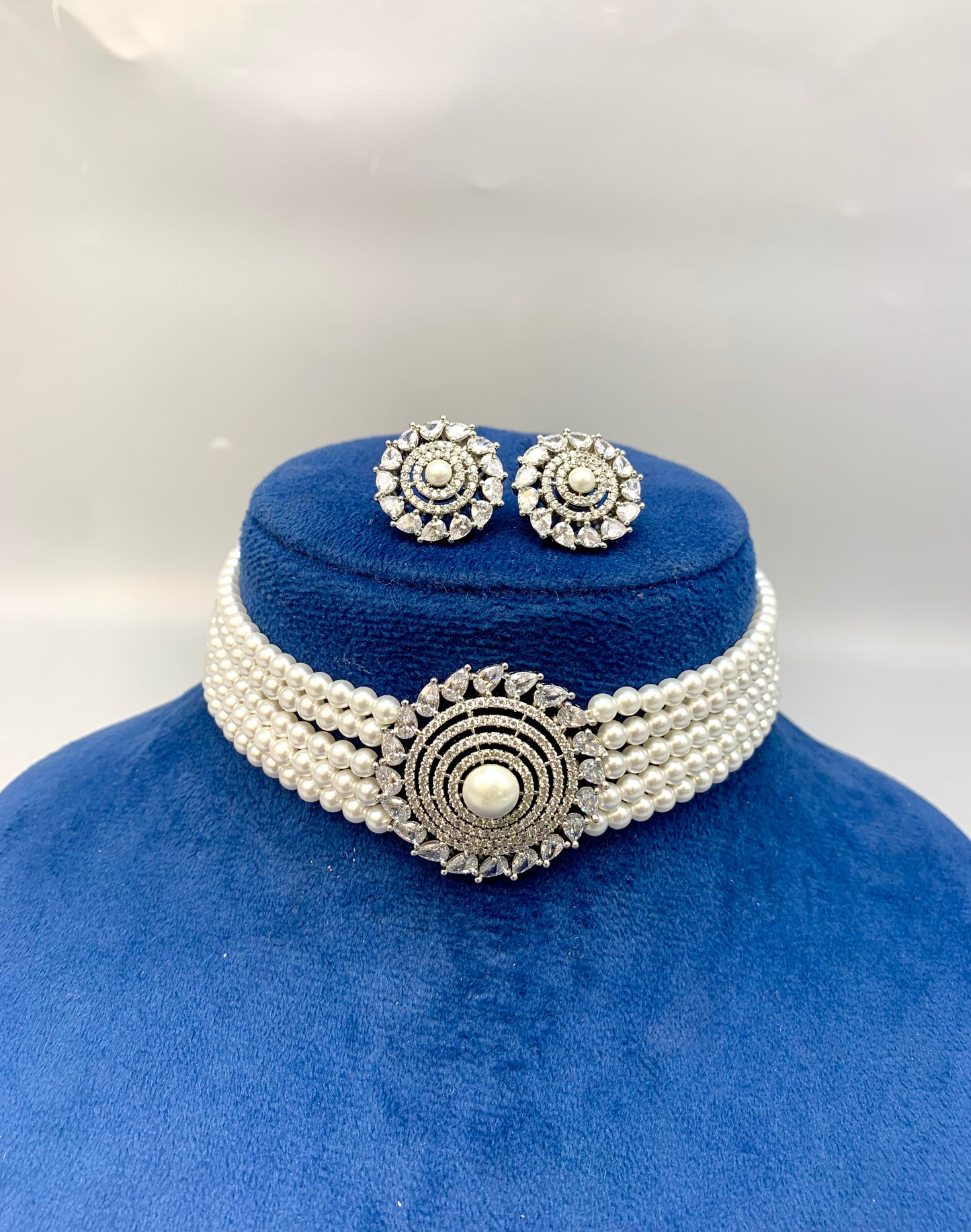 Erina handcrafted rhodium plated choker set with American diamonds pearls 