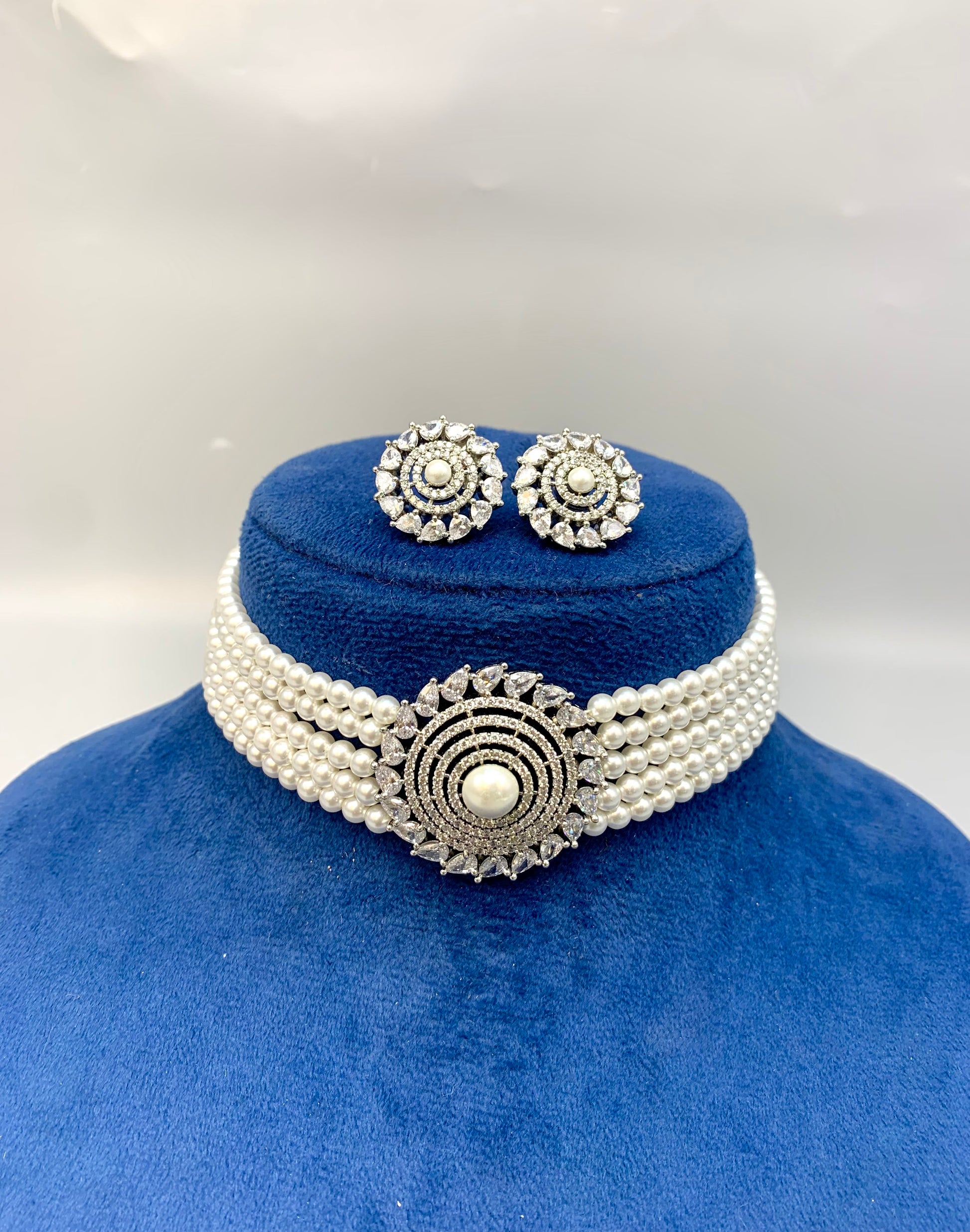 Erina handcrafted rhodium plated choker set with American diamonds pearls 