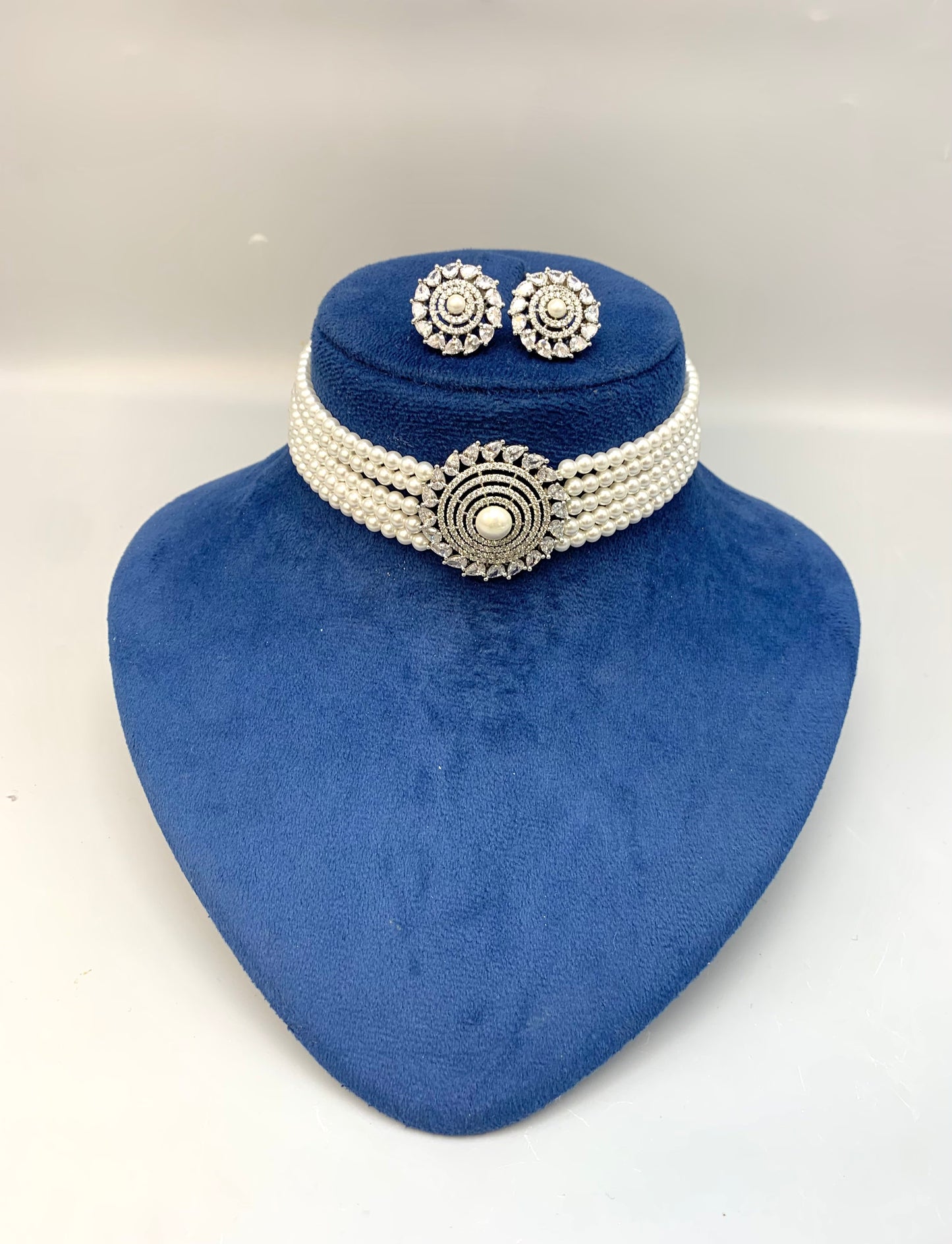 Erina handcrafted rhodium plated choker set with American diamonds pearls 