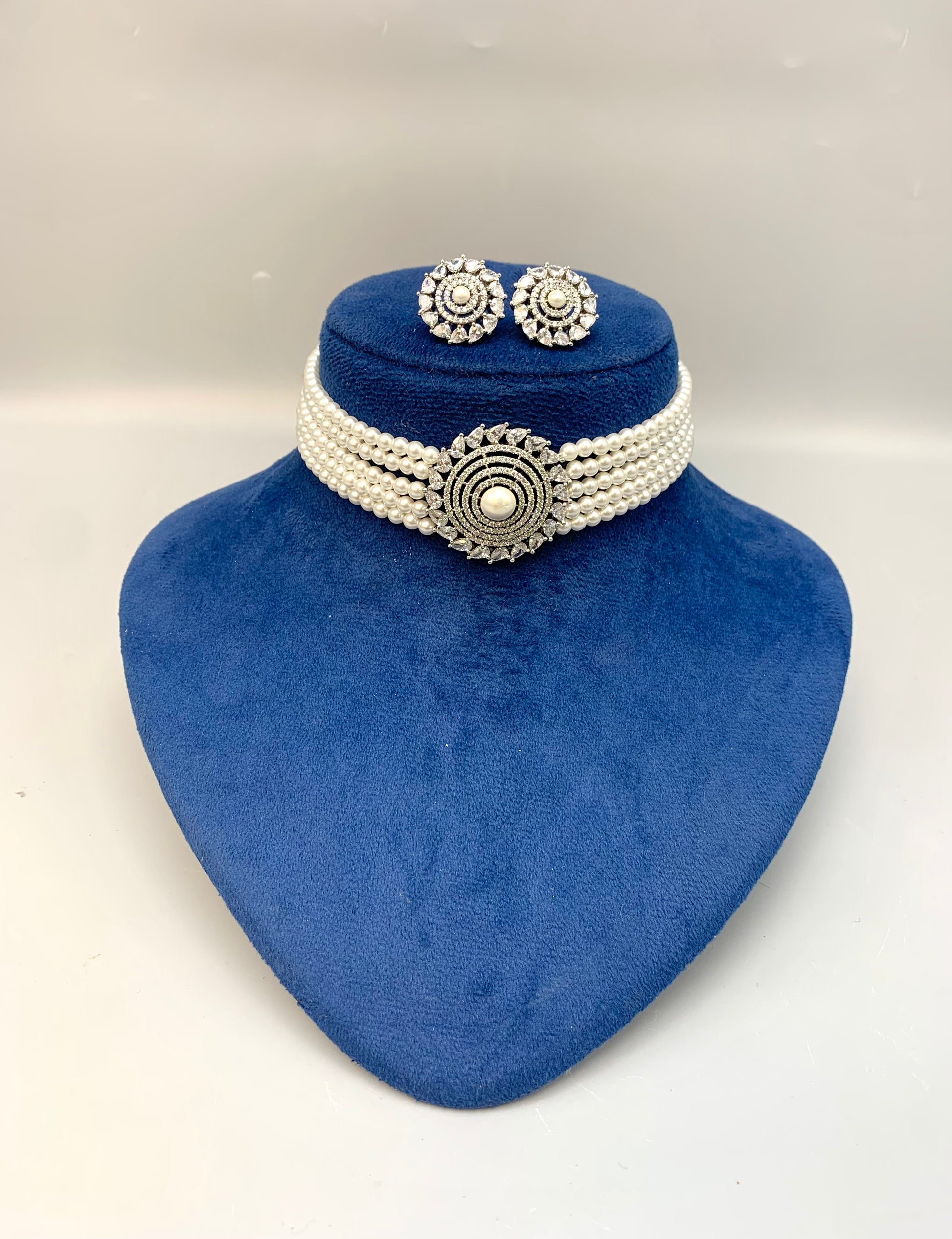 Erina handcrafted rhodium plated choker set with American diamonds pearls 