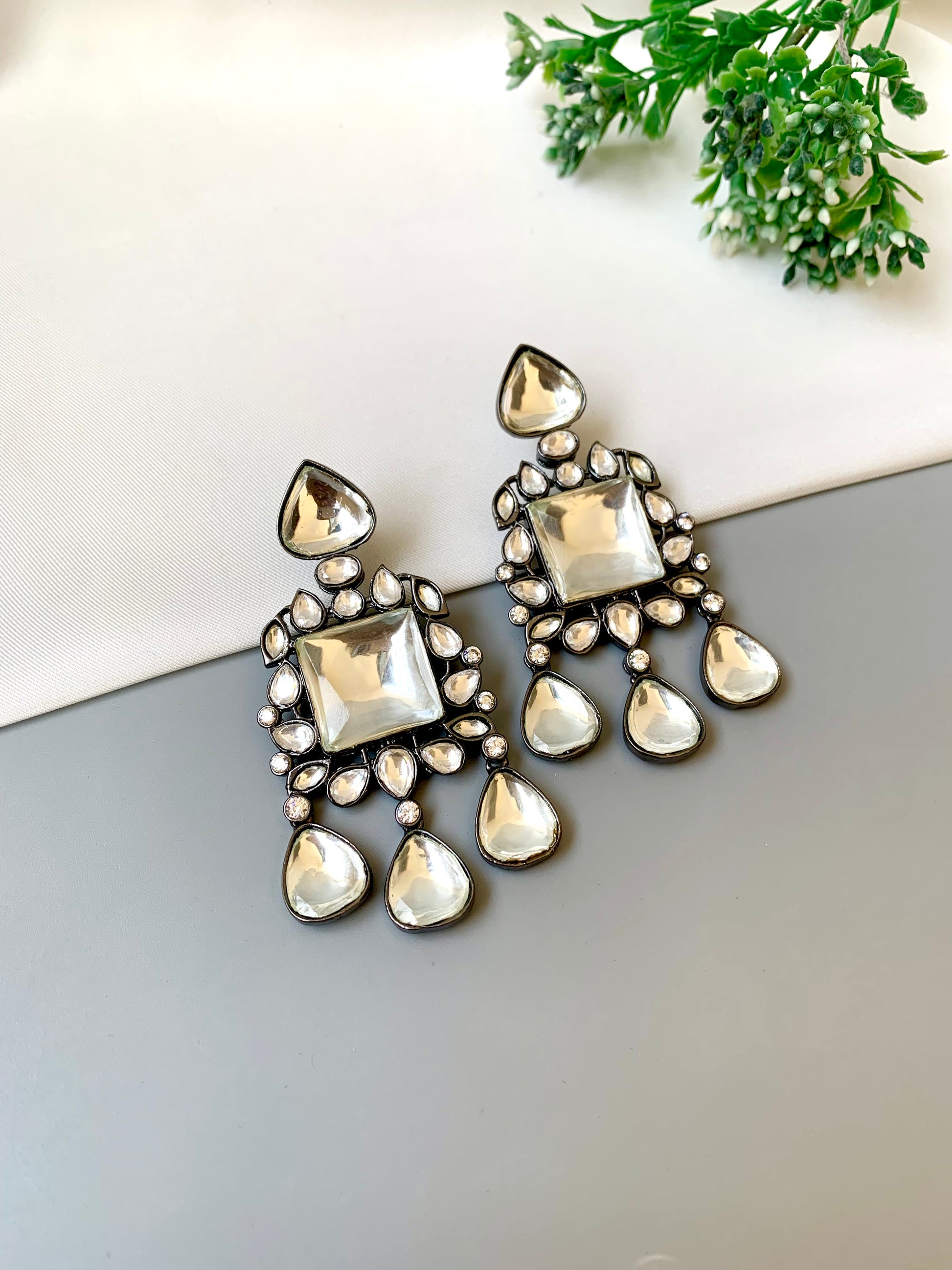 Erina handcrafted rhodium oxidized earrings with high quality polki kundan