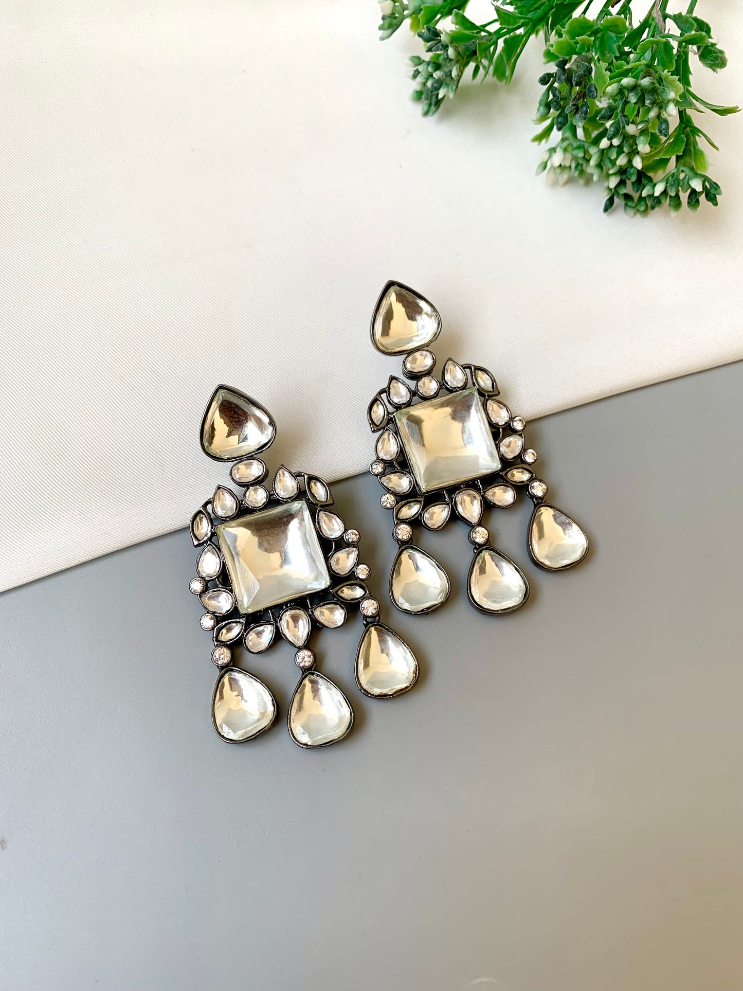 Erina handcrafted rhodium oxidized earrings with high quality polki kundan