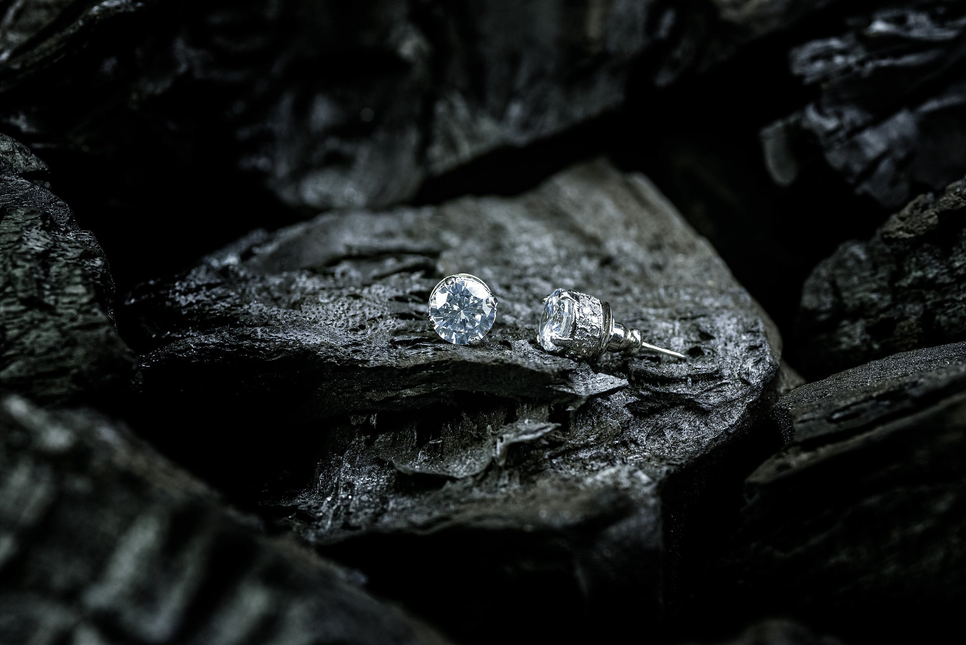 Close-up of rhodium-plated Ester studs featuring diamond-cut American Diamonds