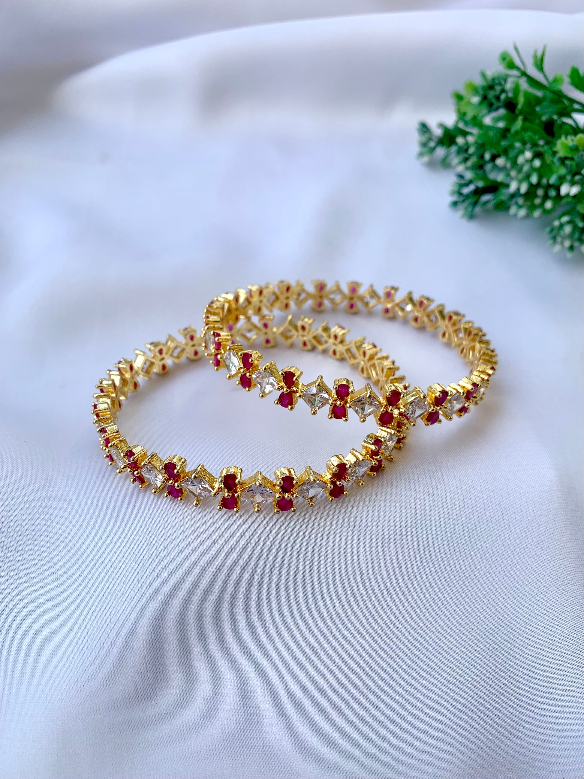 Gisha ruby gold plated slide on bangles with American diamonds sold as pair size 2.6