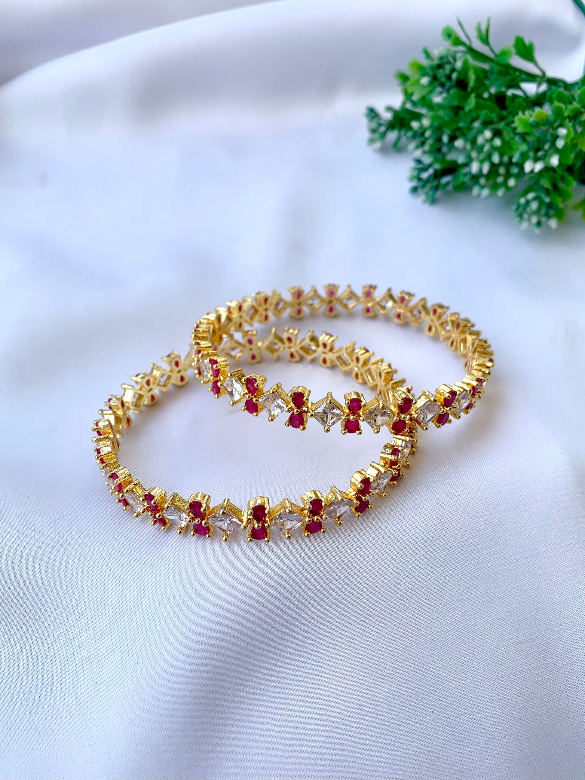 Gisha ruby gold plated slide on bangles with American diamonds sold as pair size 2.6