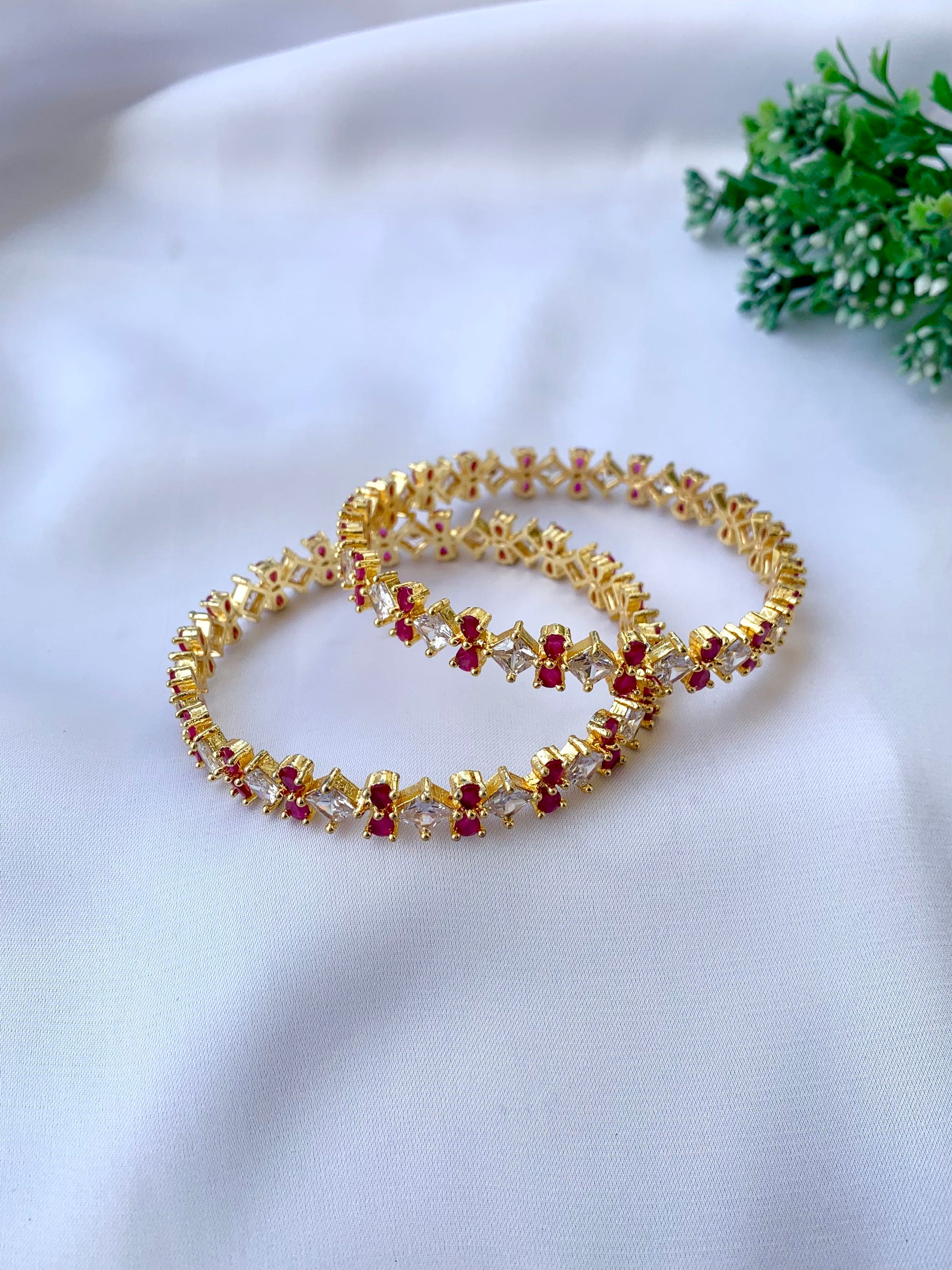 Gisha ruby gold plated slide on bangles with American diamonds sold as pair size 2.6