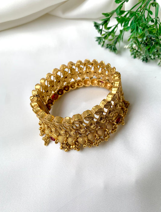 Handcrafted 22kt gold plated openable screw bangle with intricate floral detailing, fits sizes 2.6 and 2.8