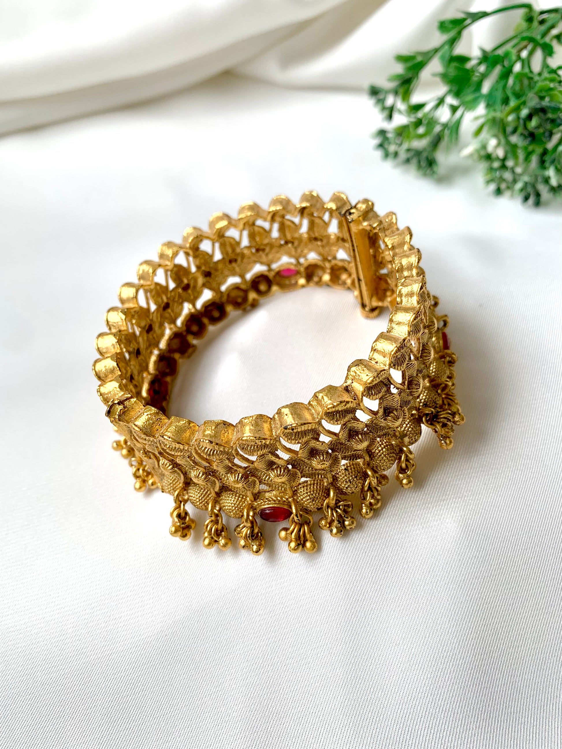 Handcrafted 22kt gold plated openable screw bangle with intricate floral detailing, fits sizes 2.6 and 2.8