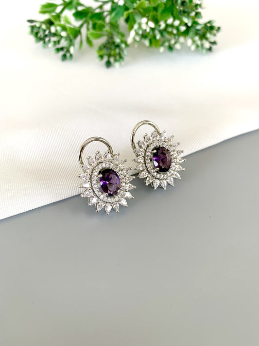 Front view of Hermona Amethyst Studs in rhodium finish with American Diamond surround