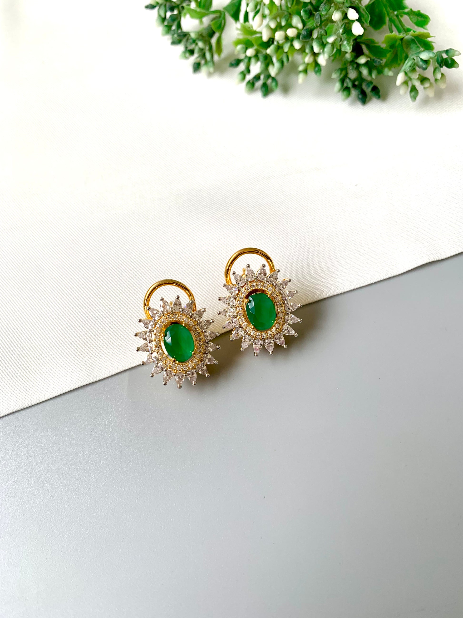 Close-up of Zamal Jewels’ Emerald and Diamond Studs