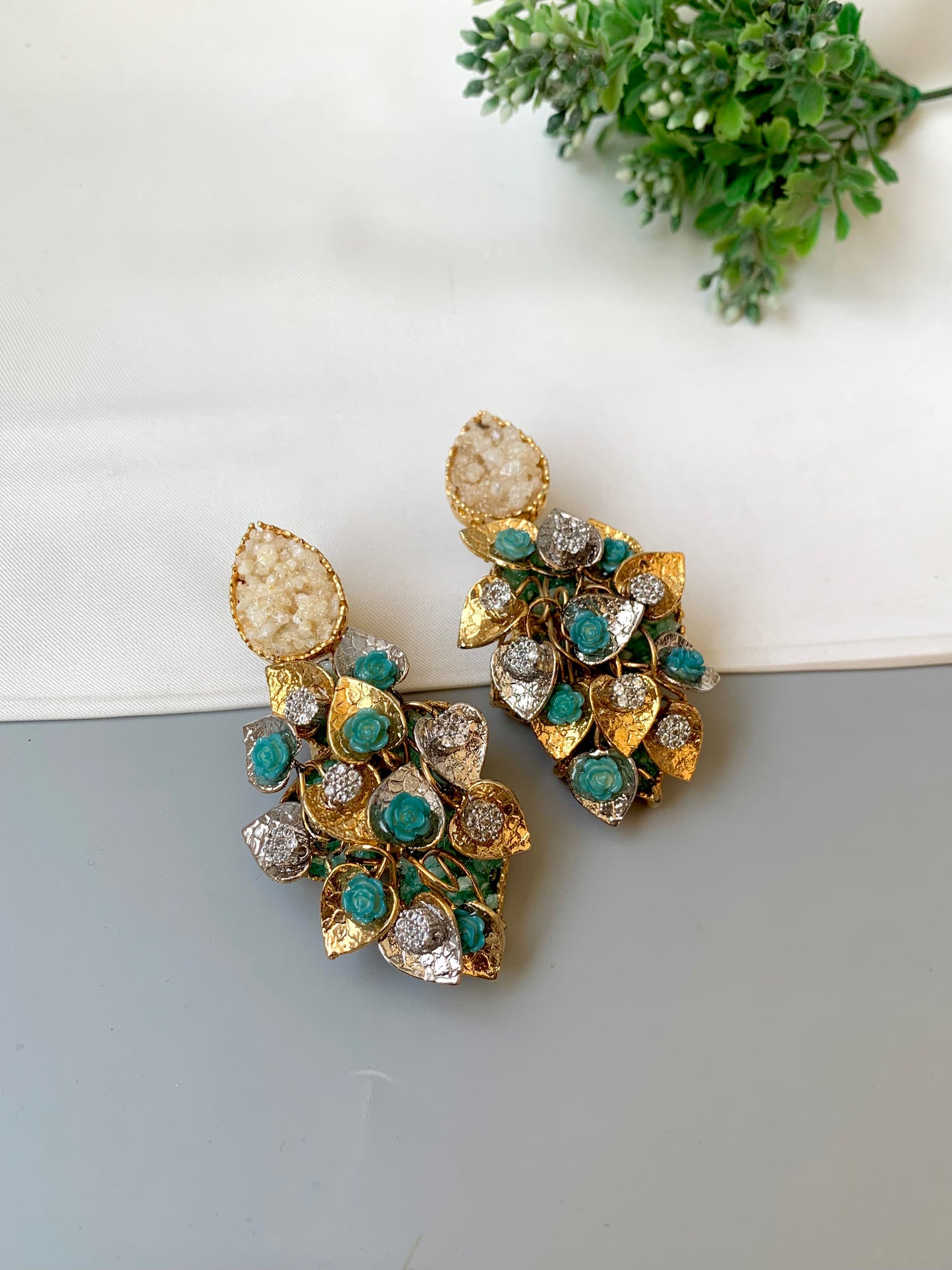 Iris designer earrings in 22kt gold plating with american diamonds and natural gemstones