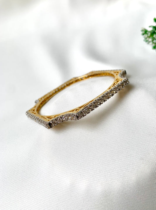 Handcrafted 22kt gold plated bangle with high quality American Diamonds in a crown silhouette, fits size 2.4 and 2.6