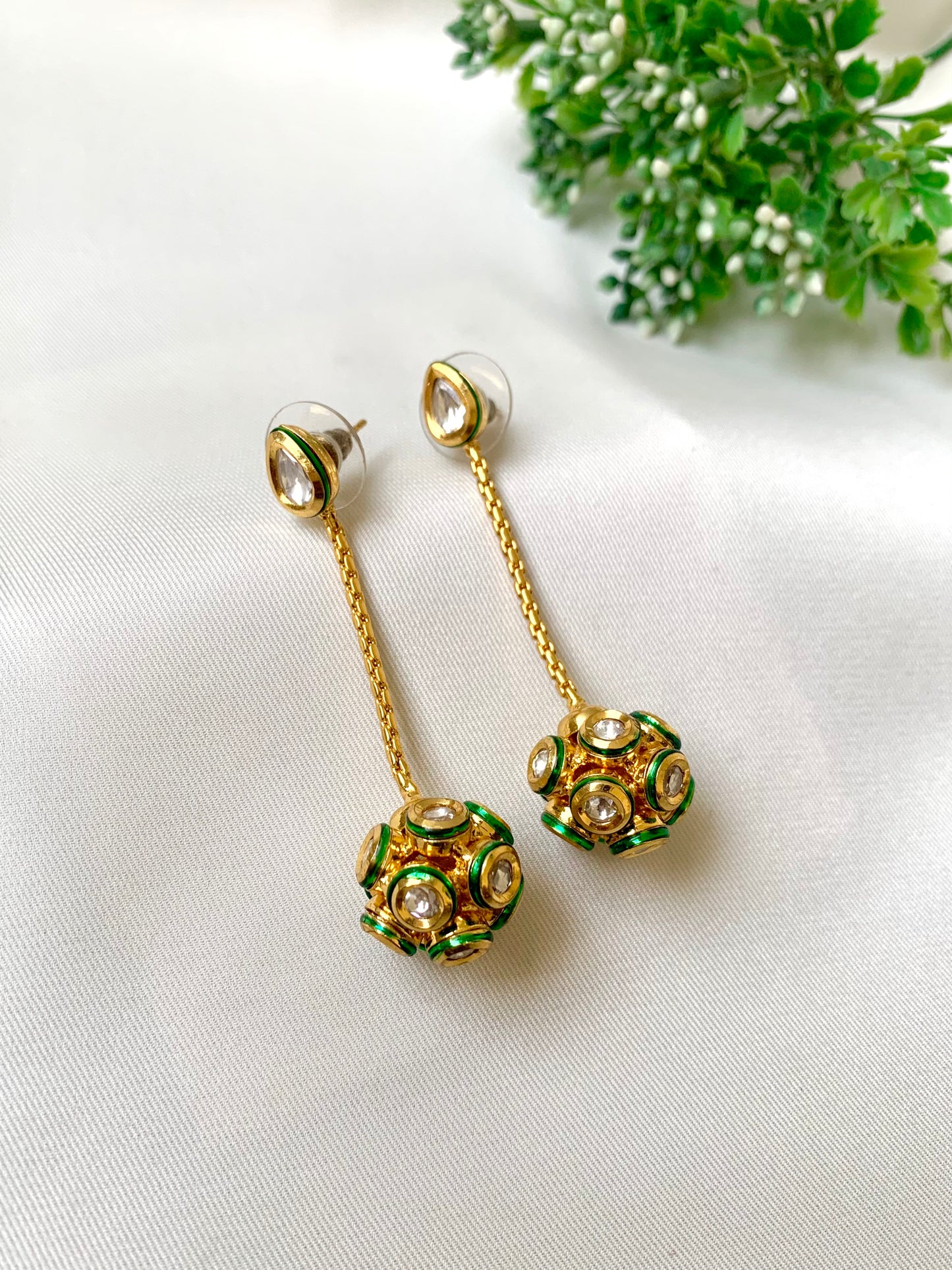 Hand crafted Kemya Earrings in 22kt gold plating featuring premium Bikanairi Kundan and hand-painted Meena work