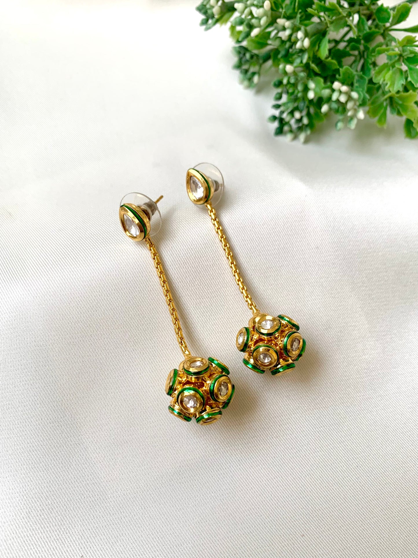 Hand crafted Kemya Earrings in 22kt gold plating featuring premium Bikanairi Kundan and hand-painted Meena work