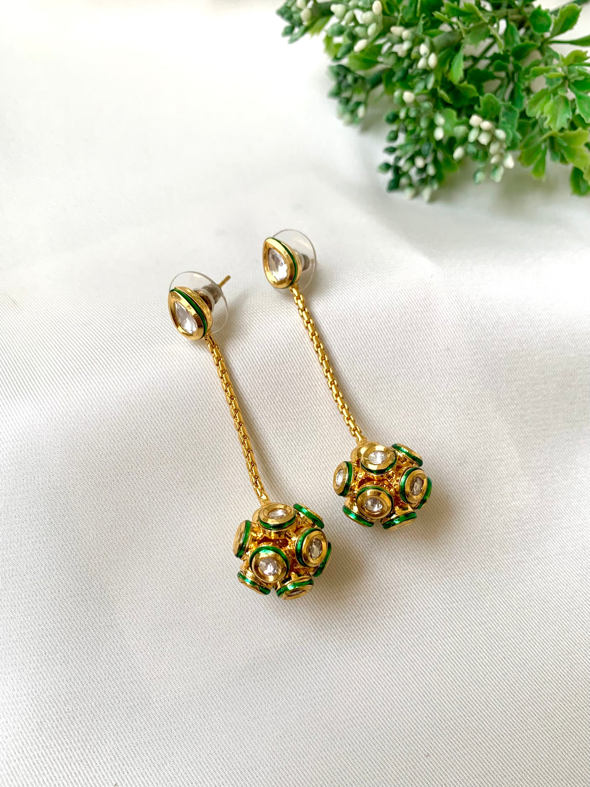 Hand crafted Kemya Earrings in 22kt gold plating featuring premium Bikanairi Kundan and hand-painted Meena work