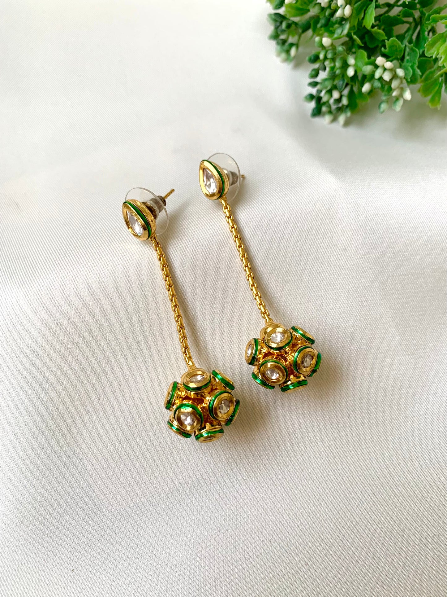 Hand crafted Kemya Earrings in 22kt gold plating featuring premium Bikanairi Kundan and hand-painted Meena work