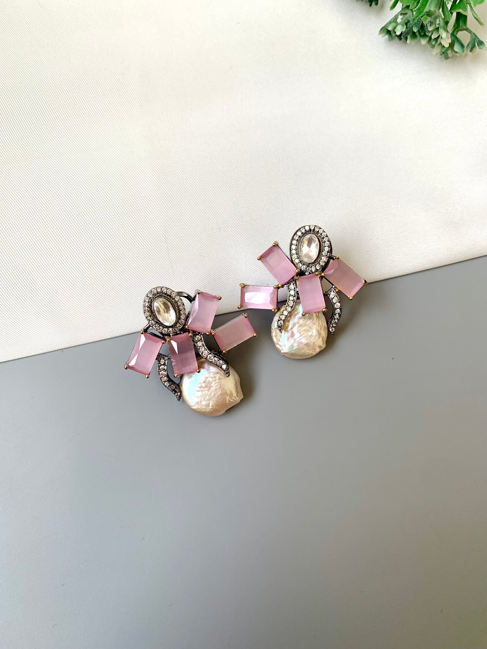 Klara pink onyx polki kundan studs in rhodium oxidized finish with baroque pearls