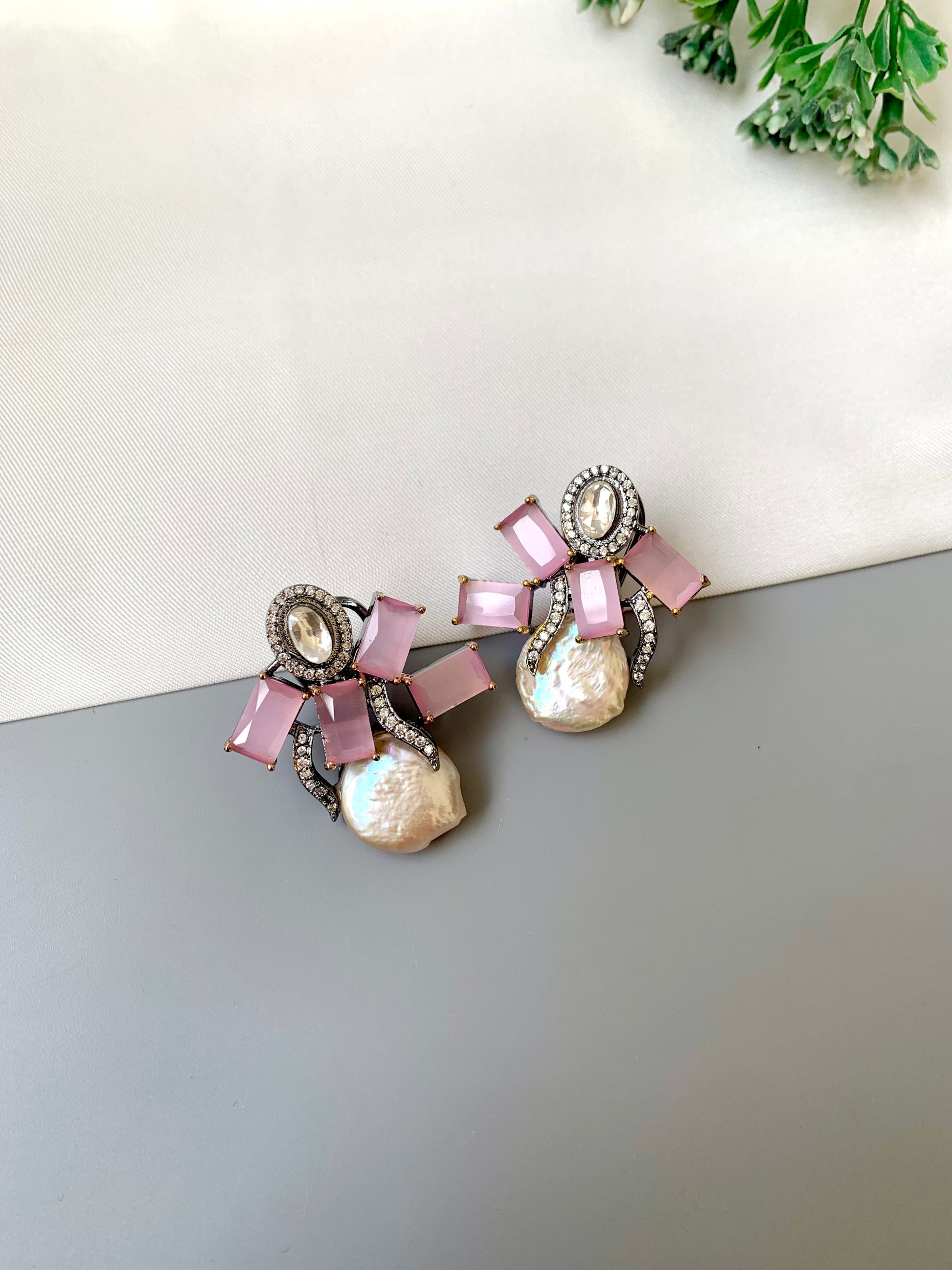 Klara pink onyx polki kundan studs in rhodium oxidized finish with baroque pearls