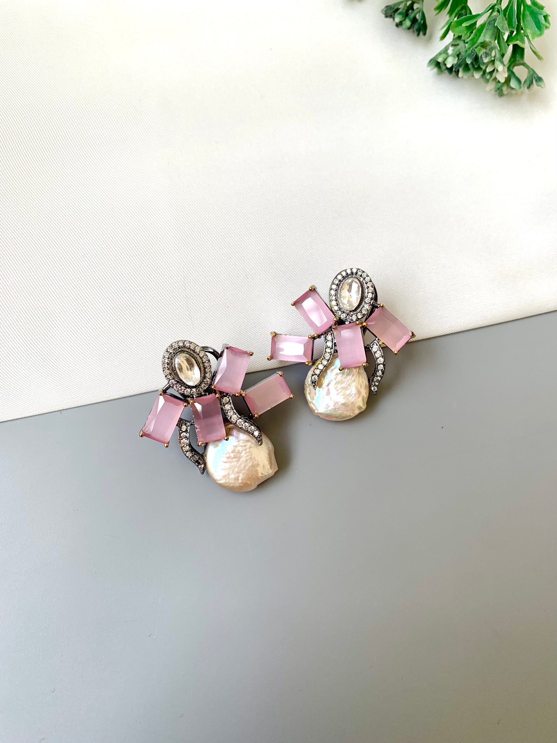 Klara pink onyx polki kundan studs in rhodium oxidized finish with baroque pearls
