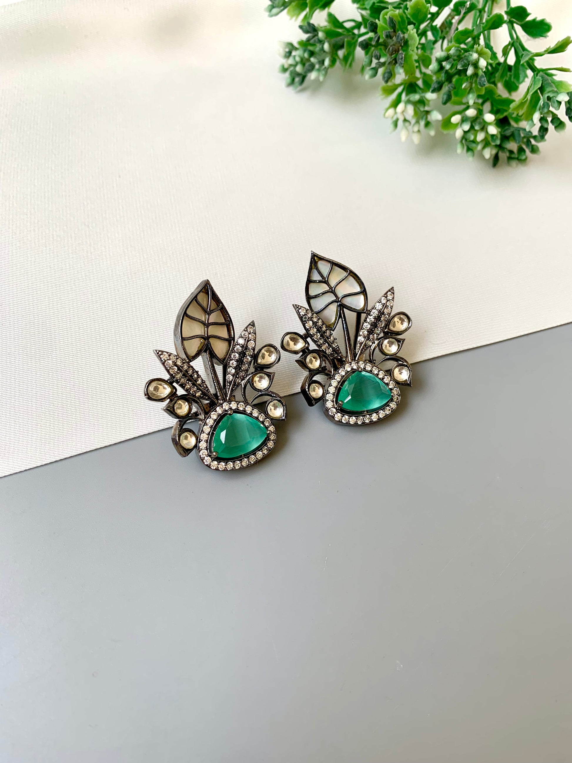 Laela rhodium mint designer earrings with polki kundan, mother of pearl and american diamonds