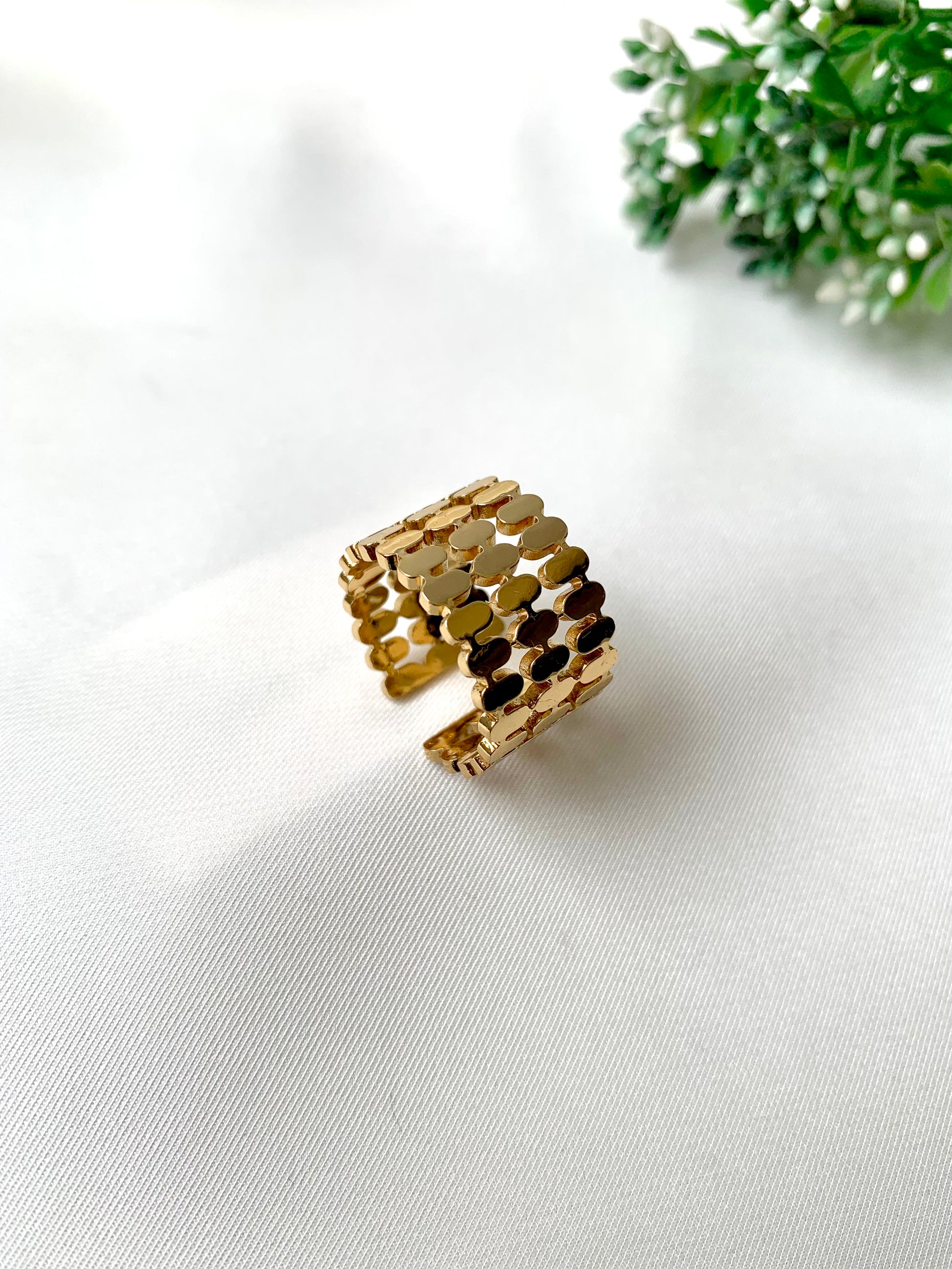Gold-plated adjustable ring with geometric loops, part of Zamal Jewels' Forma Collection