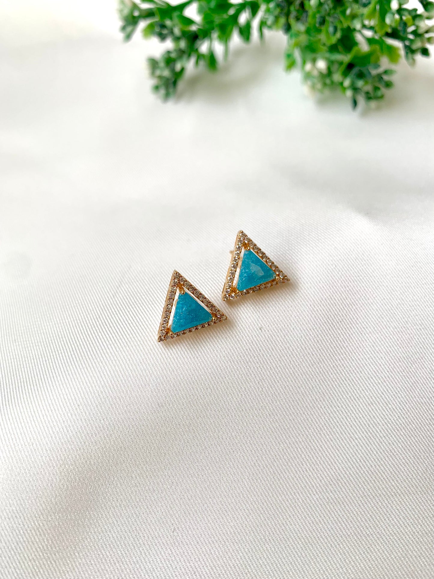 Delicate triangular Lumi studs in 22kt gold plating with American Diamonds and pastel blue natural milky stone