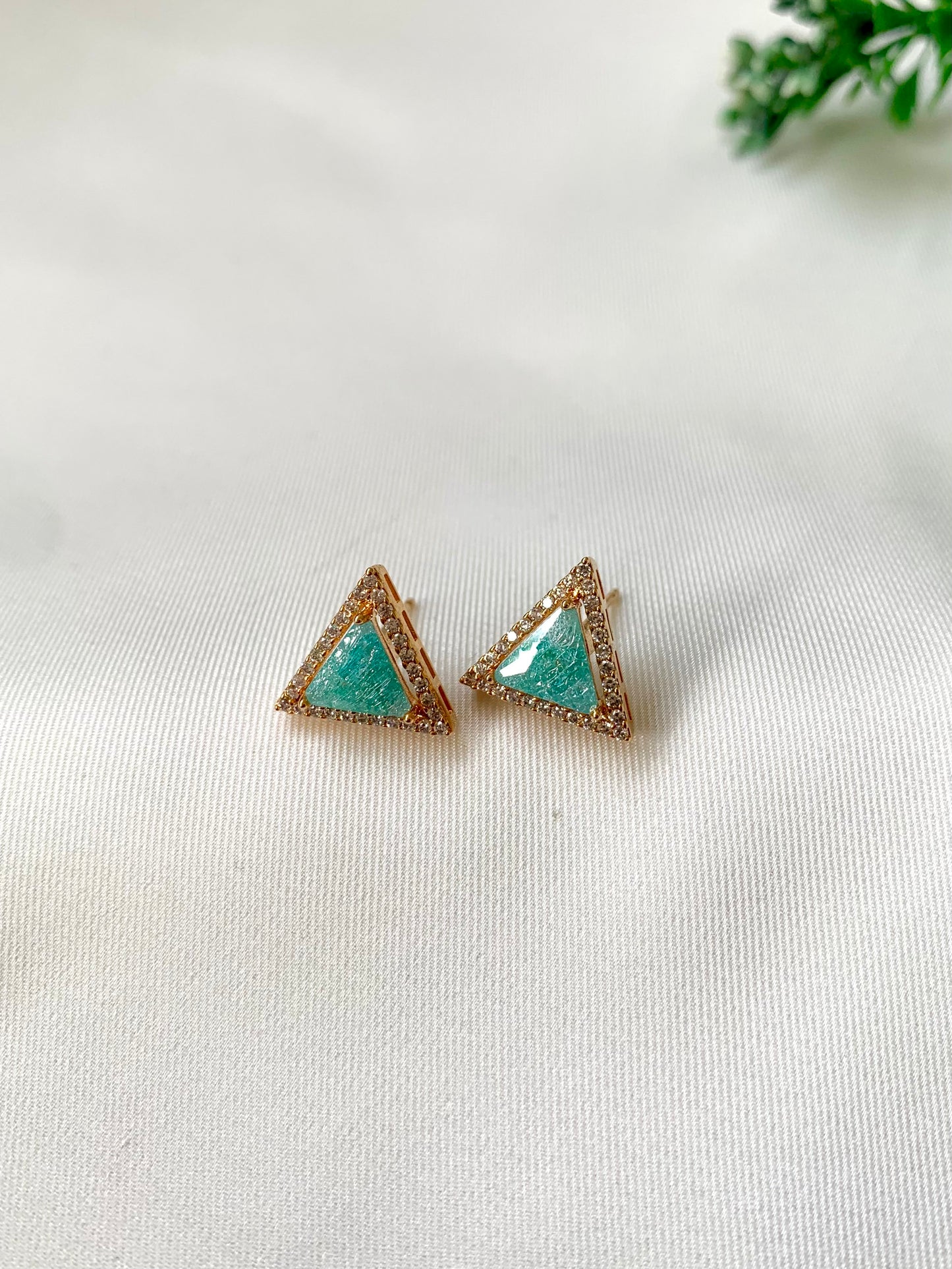 Delicate triangular Lumi studs in 22kt gold plating with American Diamonds and pastel green natural milky stone