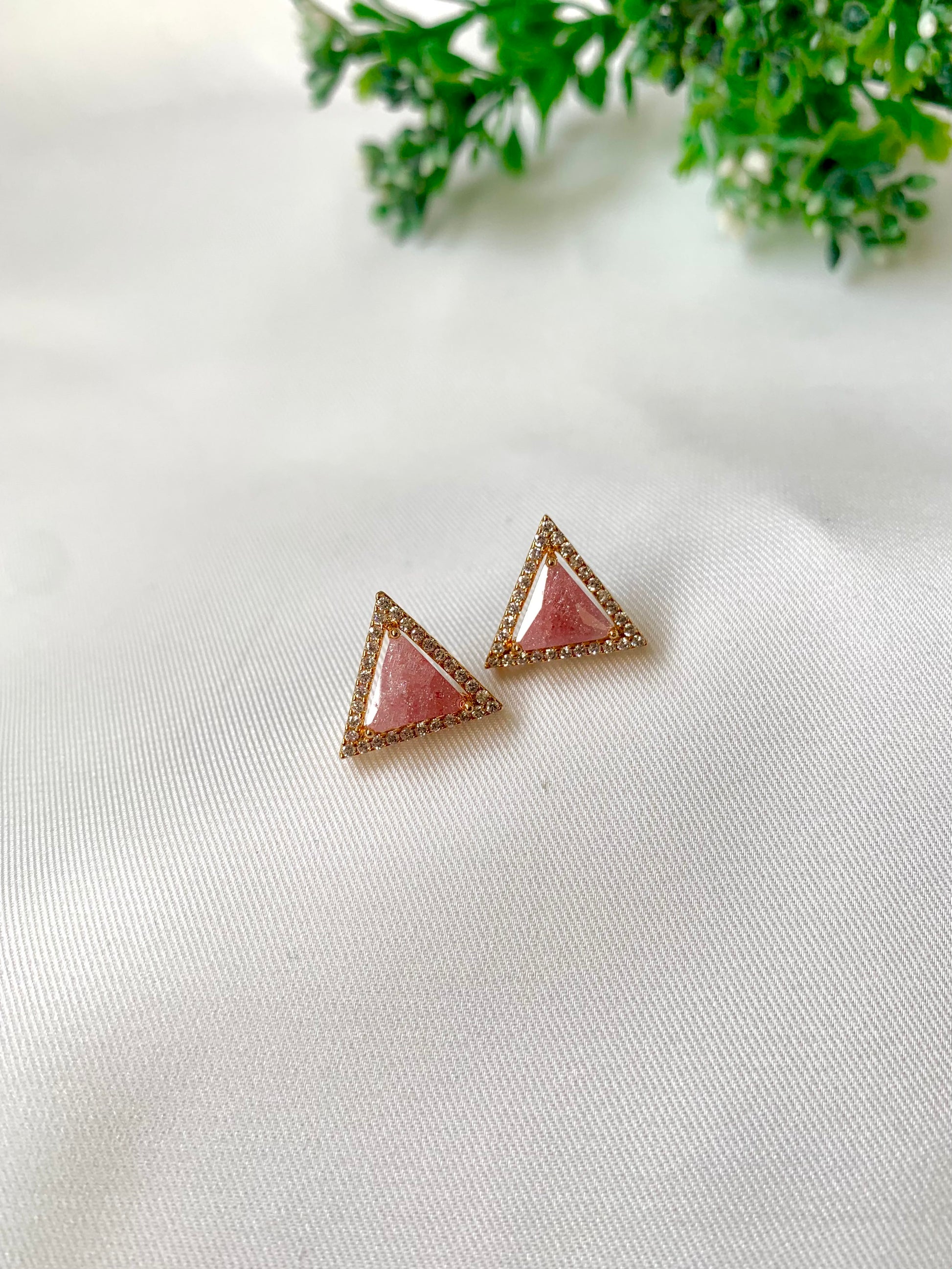Delicate triangular Lumi studs in 22kt gold plating with American Diamonds and pastel pink natural milky stone