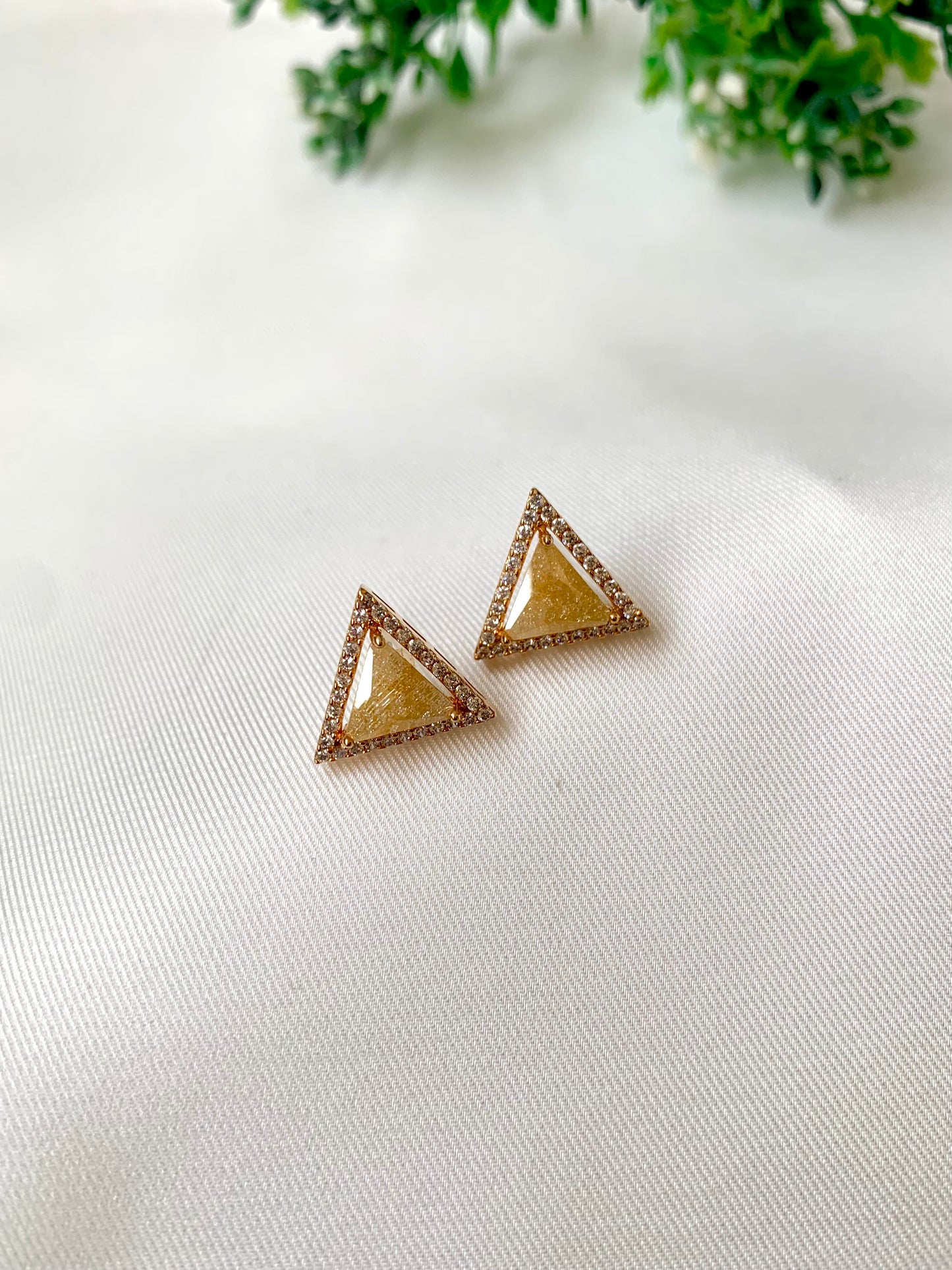 Delicate triangular Lumi studs in 22kt gold plating with American Diamonds and pastel yellow natural milky stone