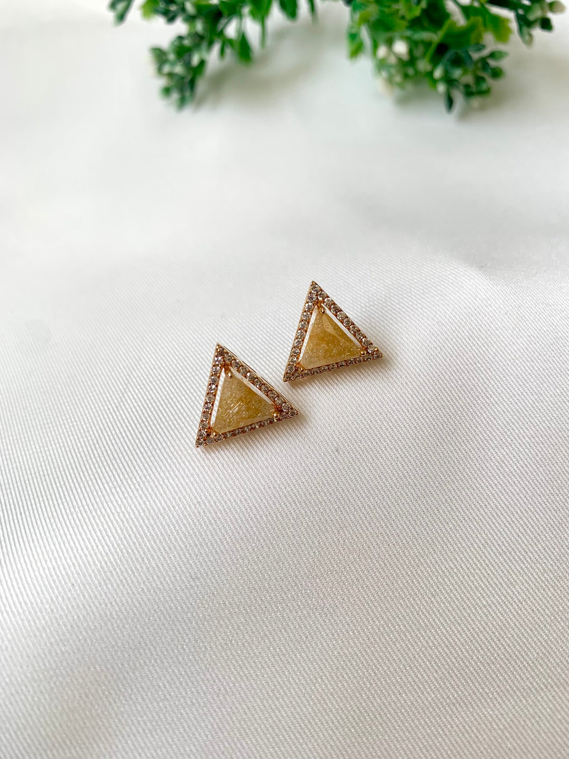 Delicate triangular Lumi studs in 22kt gold plating with American Diamonds and pastel yellow natural milky stone