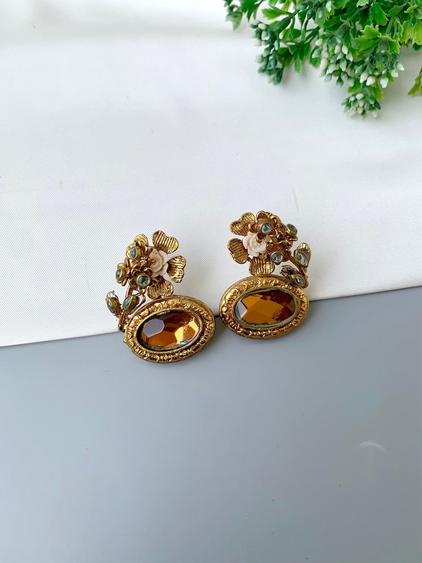 Maha floral kundan earrings in gold plating with acrylic flowers and gemstone detailing