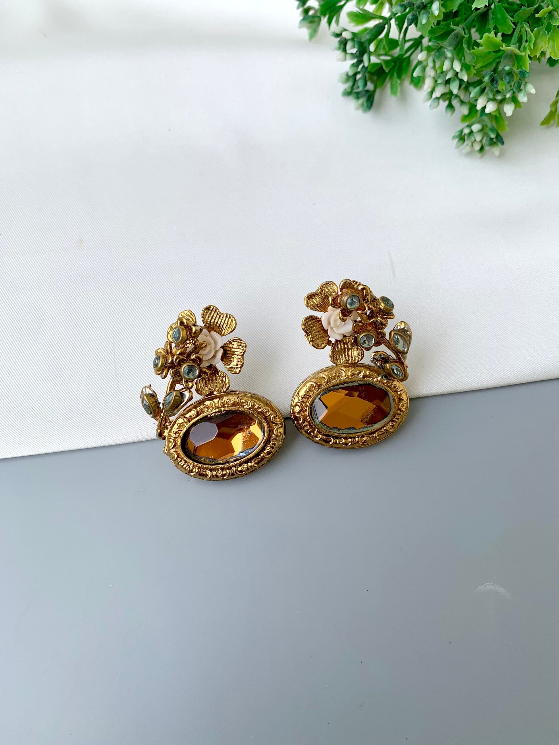 Maha floral kundan earrings in gold plating with acrylic flowers and gemstone detailing