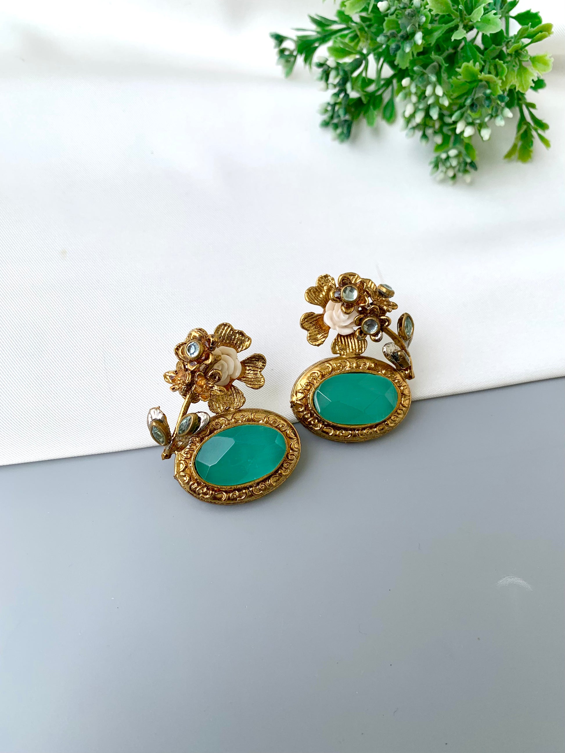 Maha floral kundan earrings in gold plating with acrylic flowers and gemstone detailing