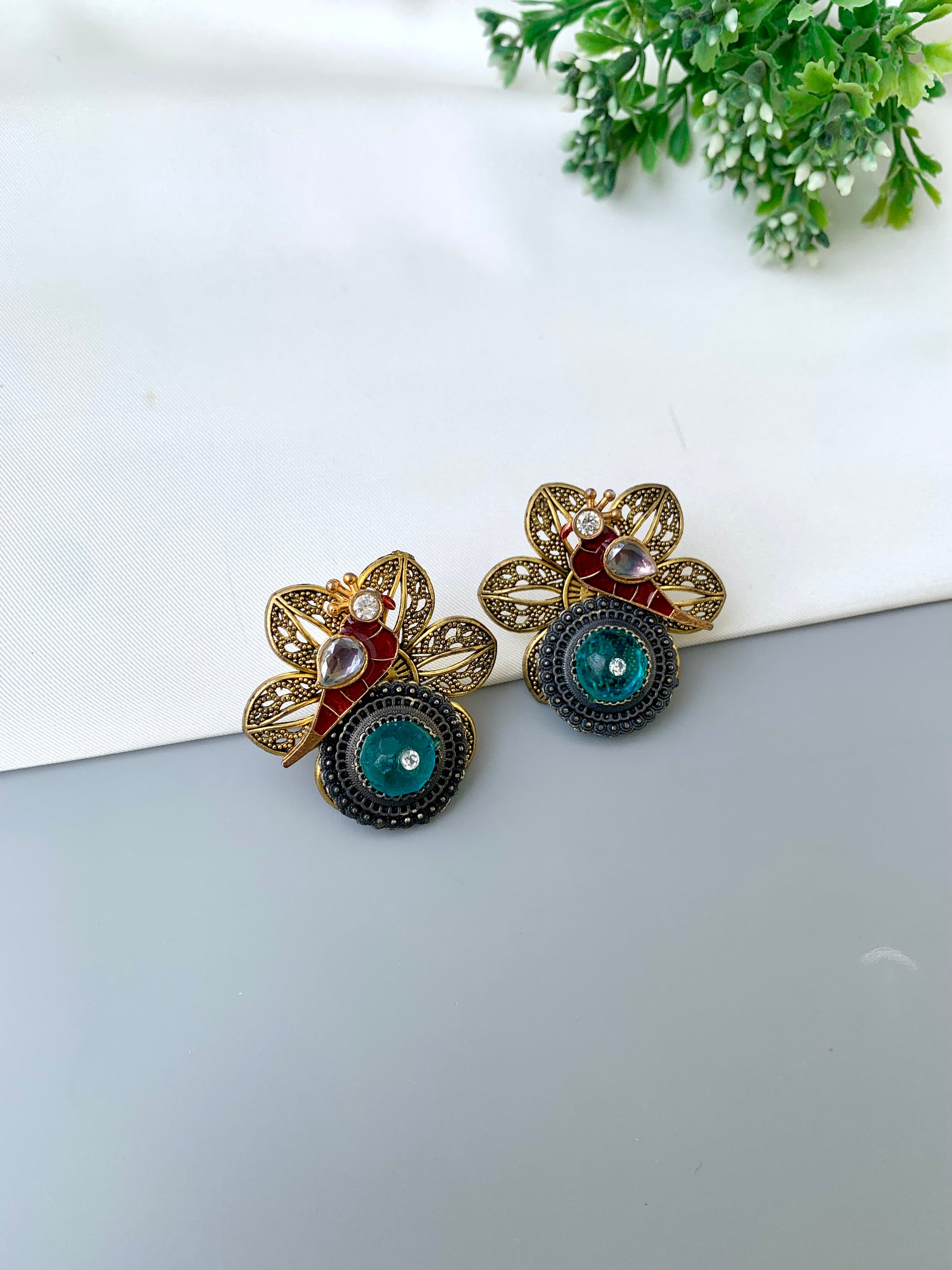 Maya aqua polki kundan earrings in gold plating with oxidized finish