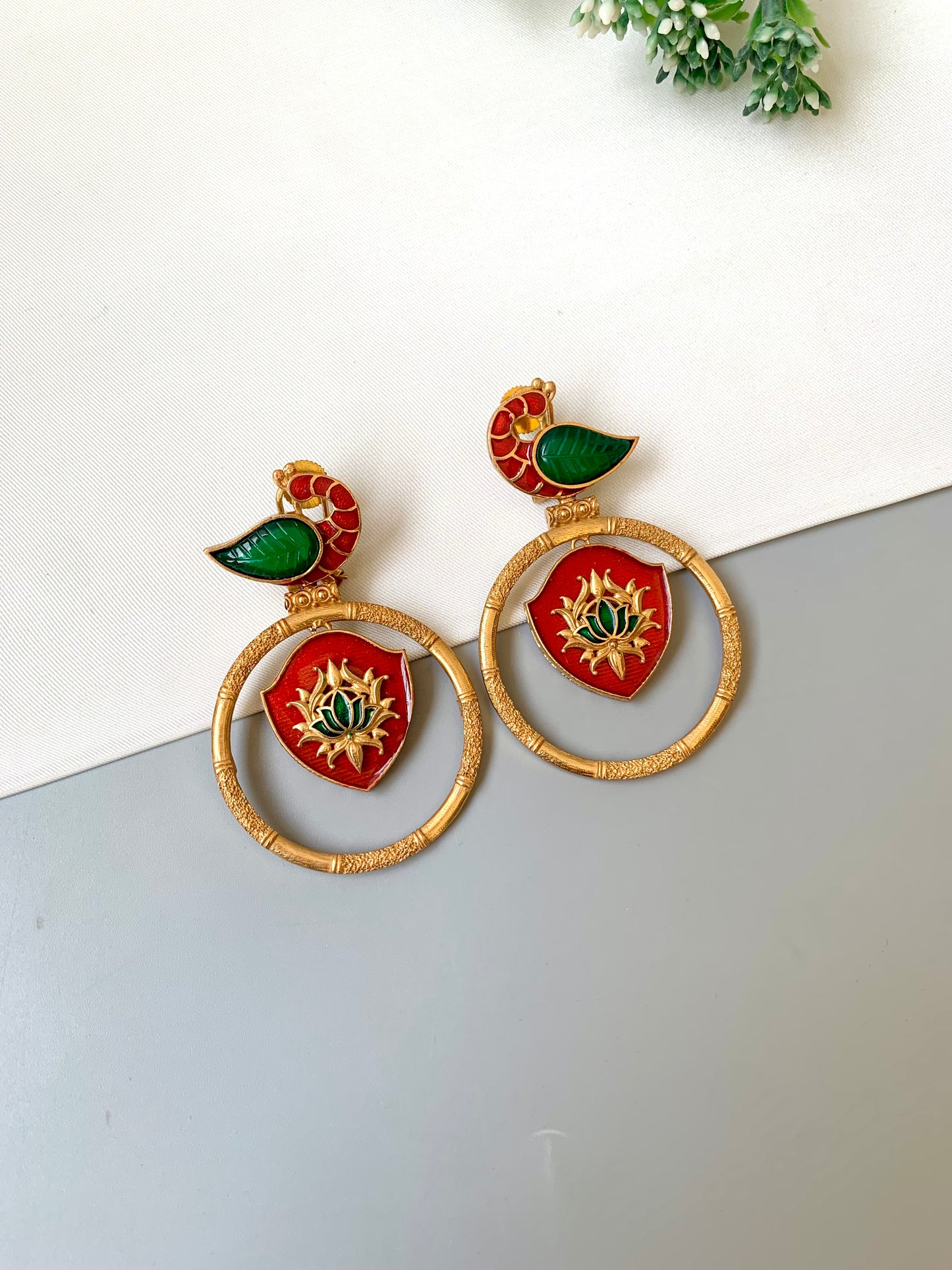 Mayura emerald peacock designer earrings in Victorian gold plating with hand painted meena