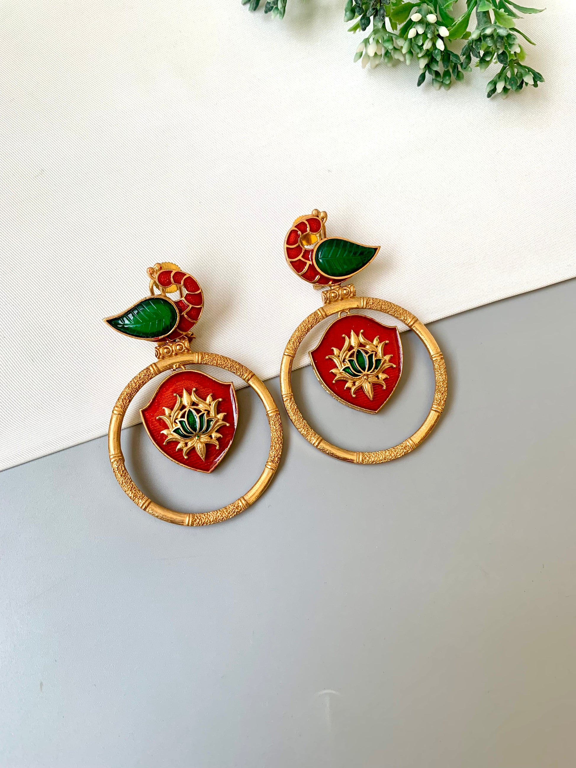 Mayura emerald peacock designer earrings in Victorian gold plating with hand painted meena