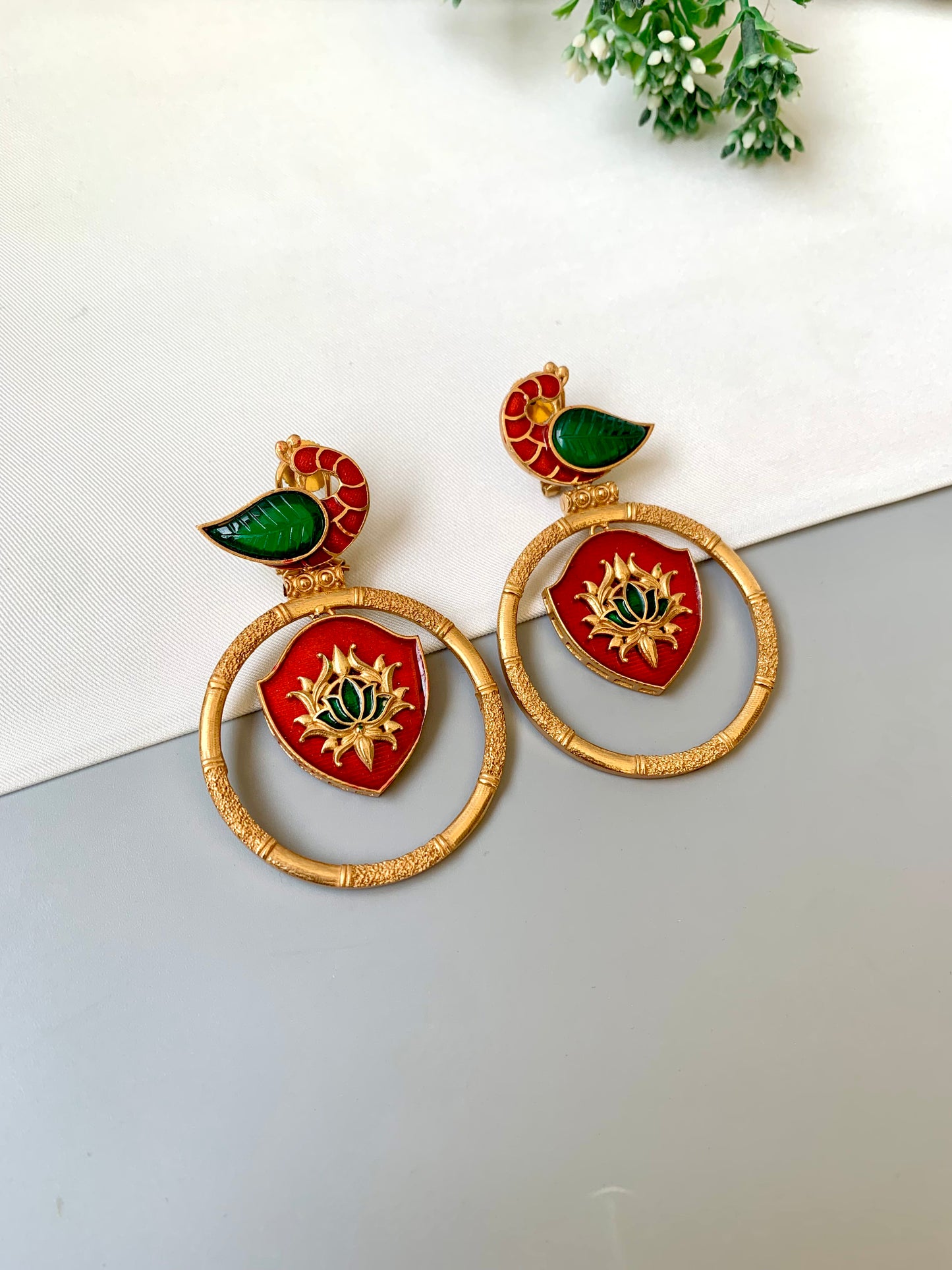 Mayura emerald peacock designer earrings in Victorian gold plating with hand painted meena