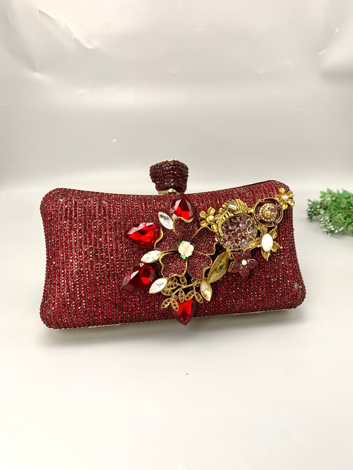 Meher handcrafted gold plated clutch with American diamonds pearls Turkish stones and natural gemstones