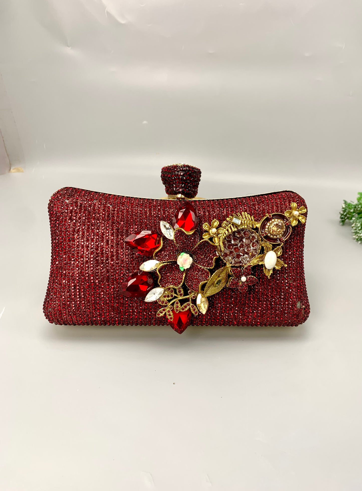 Meher handcrafted gold plated clutch with American diamonds pearls Turkish stones and natural gemstones