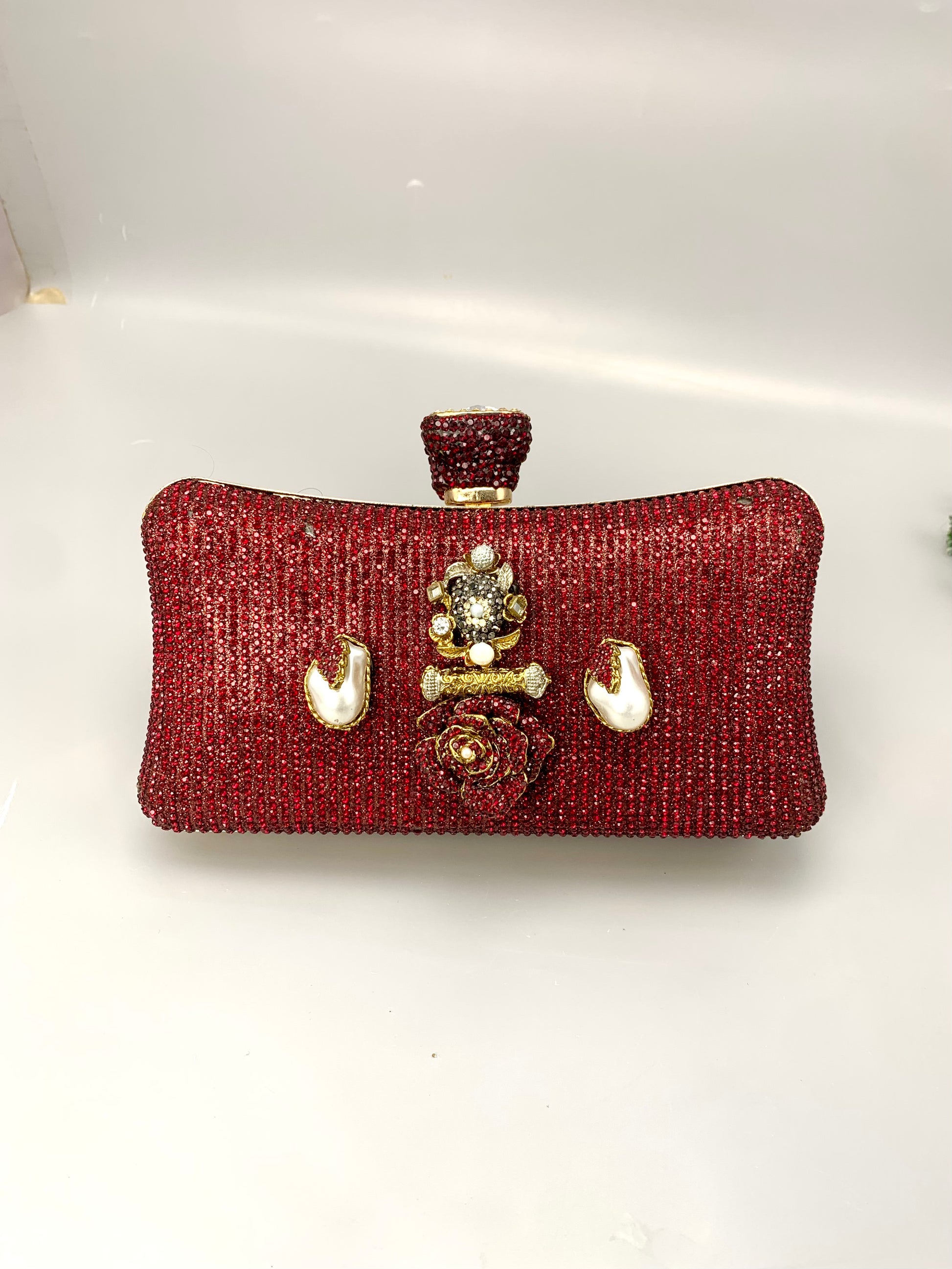 Meher handcrafted gold plated clutch with American diamonds pearls Turkish stones and natural gemstones