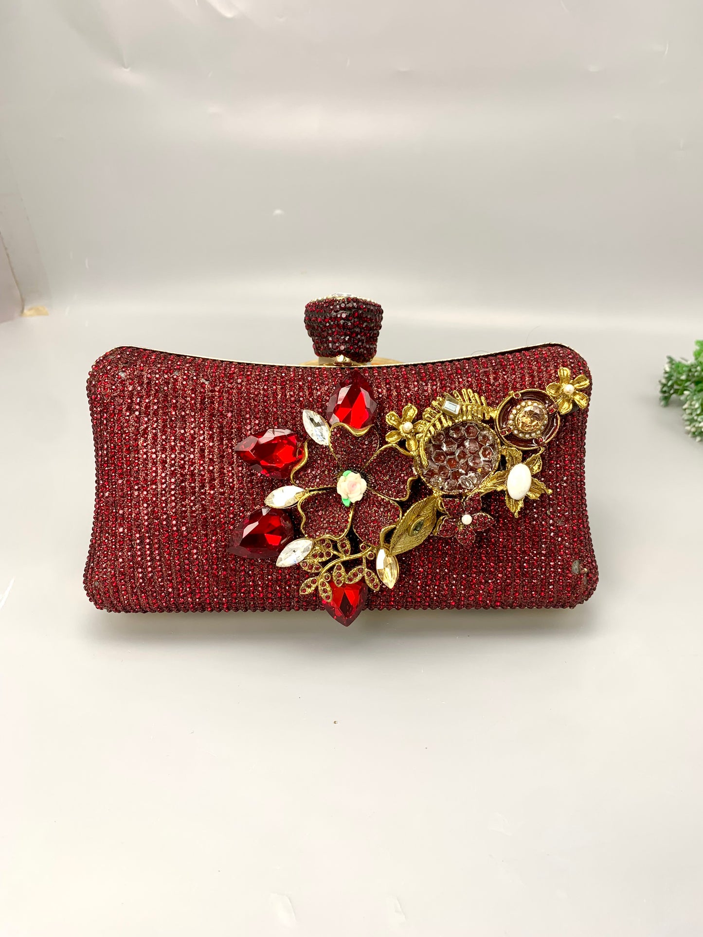 Meher handcrafted gold plated clutch with American diamonds pearls Turkish stones and natural gemstones