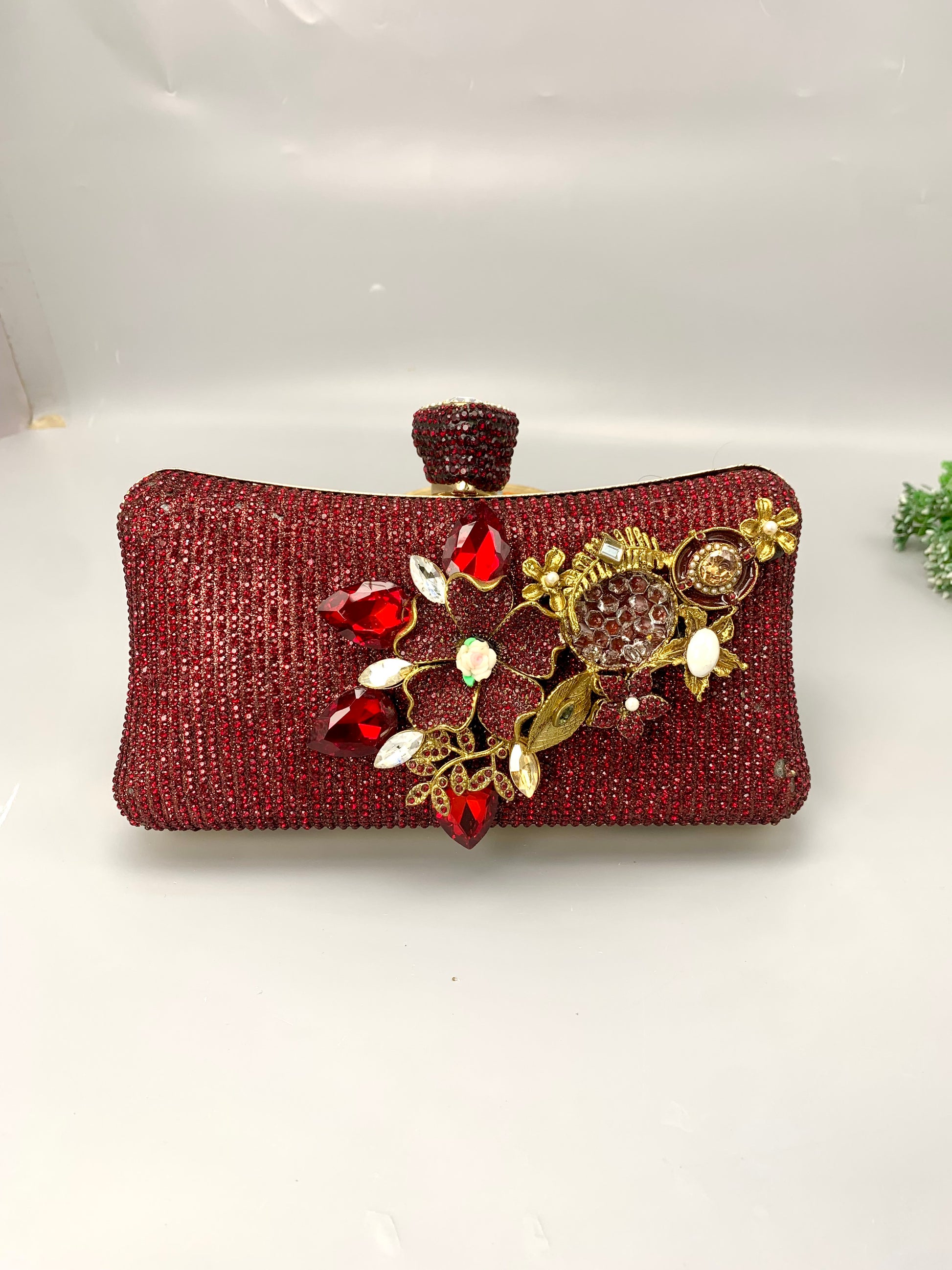 Meher handcrafted gold plated clutch with American diamonds pearls Turkish stones and natural gemstones