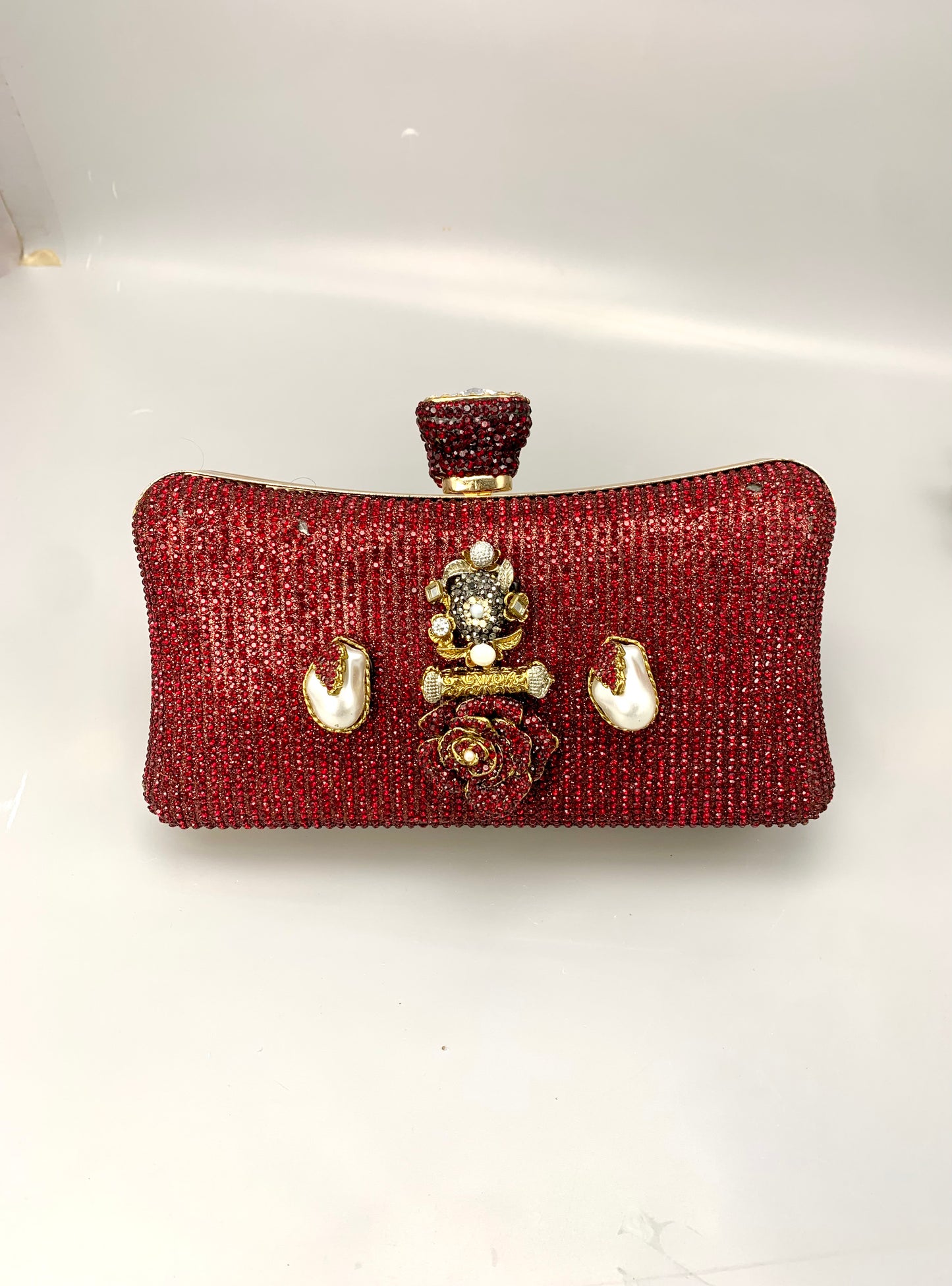 Meher handcrafted gold plated clutch with American diamonds pearls Turkish stones and natural gemstones