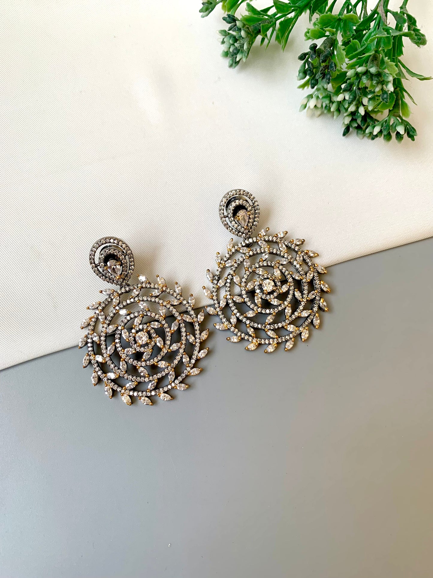 Meira handcrafted rhodium oxidized earrings with high quality American diamonds