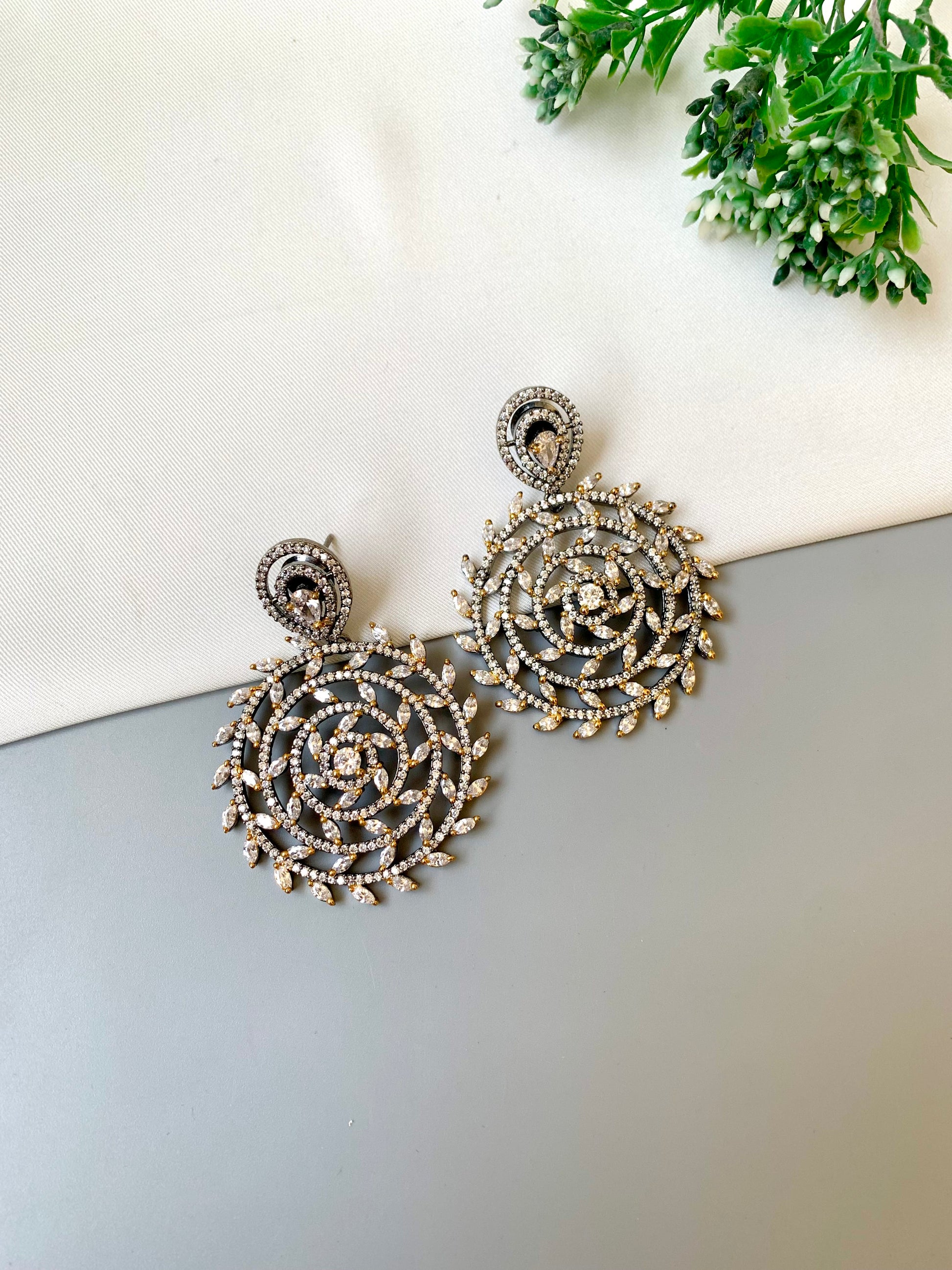 Meira handcrafted rhodium oxidized earrings with high quality American diamonds