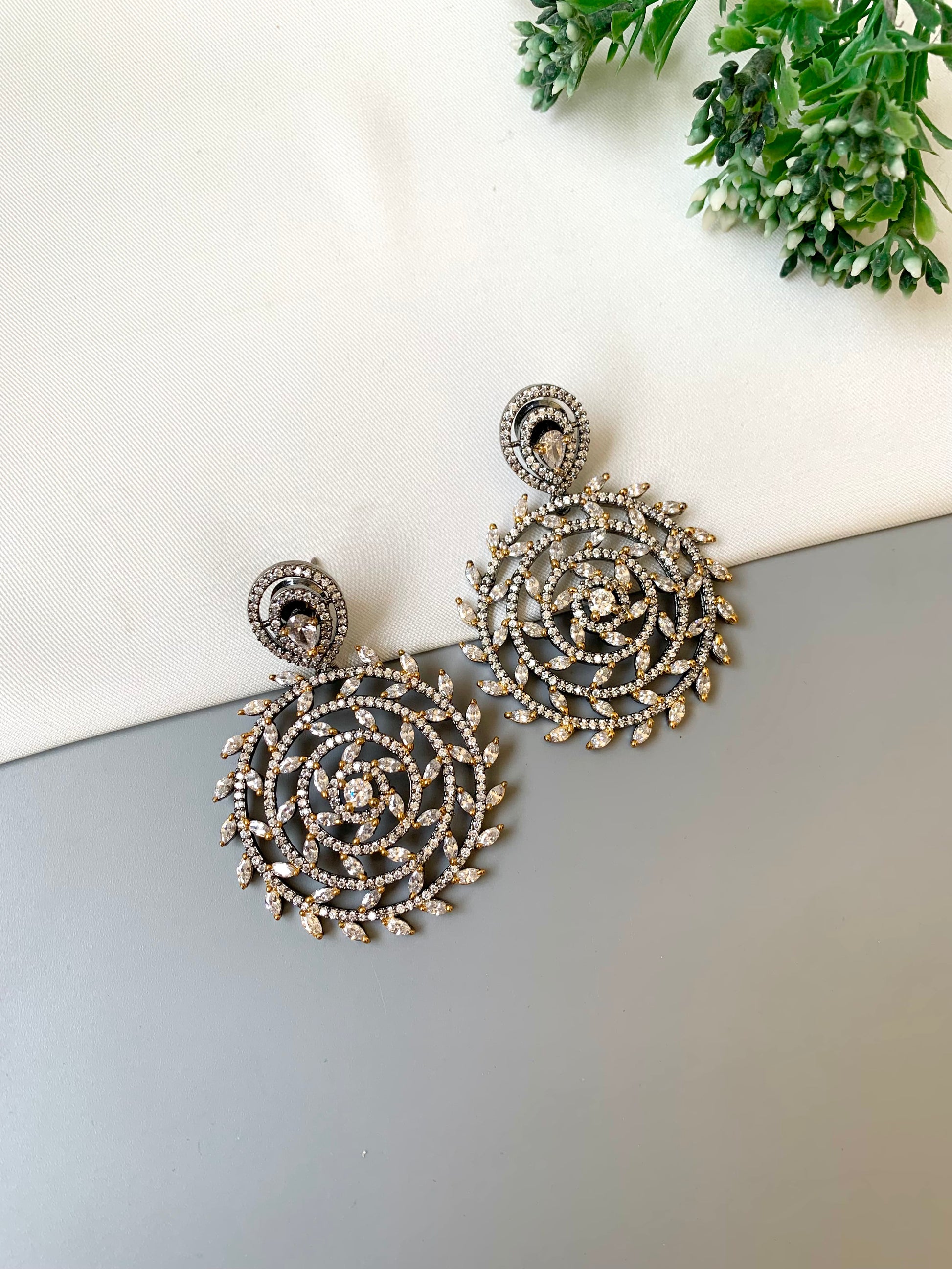 Meira handcrafted rhodium oxidized earrings with high quality American diamonds