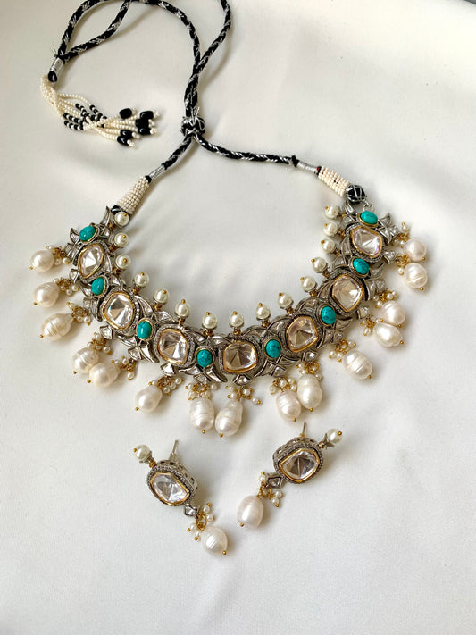 Rhodium plated handcrafted choker set with American diamonds, baroque pearls, polki kundan and feroza stones