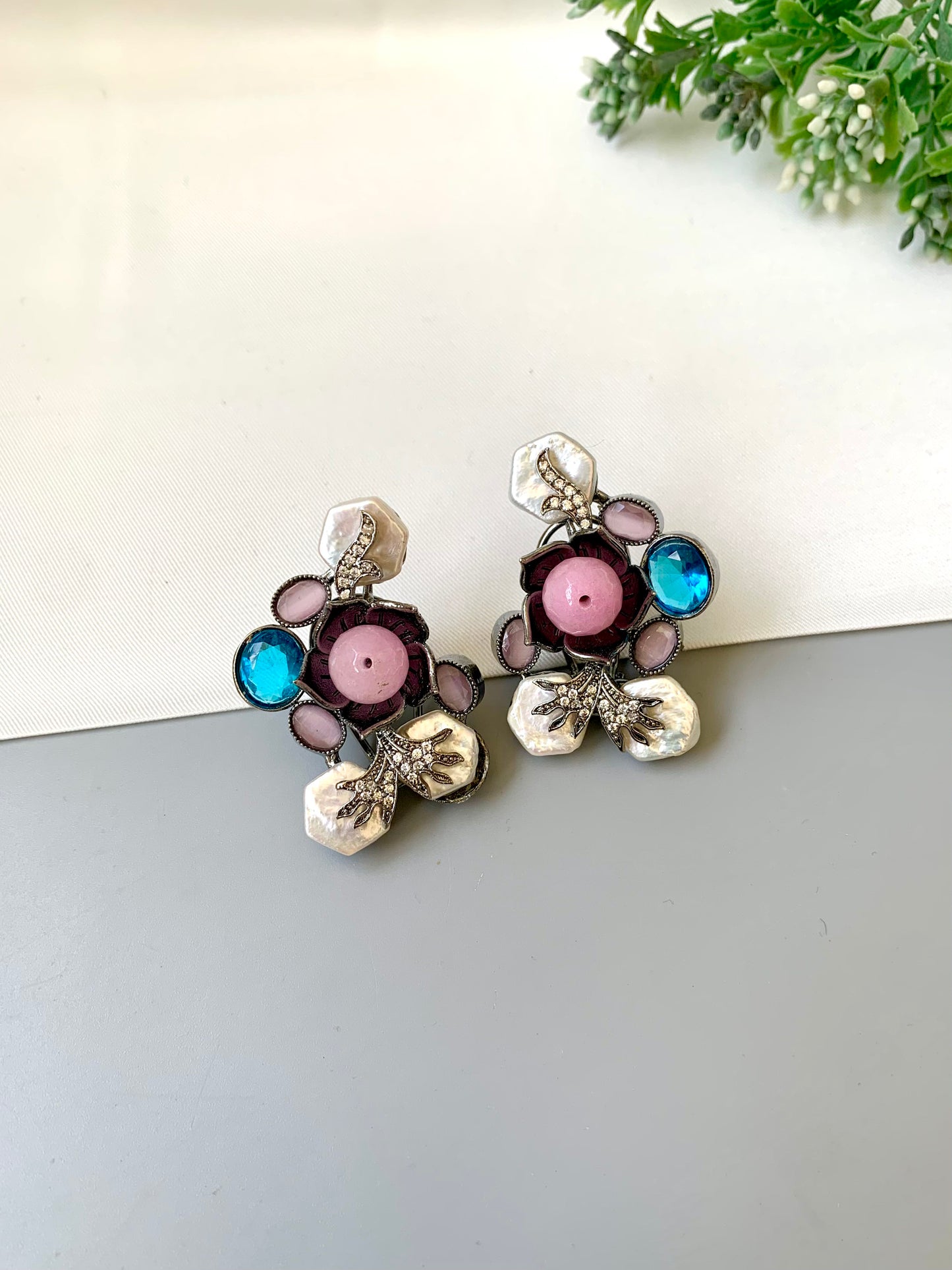 Mirana baroque pearl earrings in rhodium oxidized finish with onyx and american diamonds